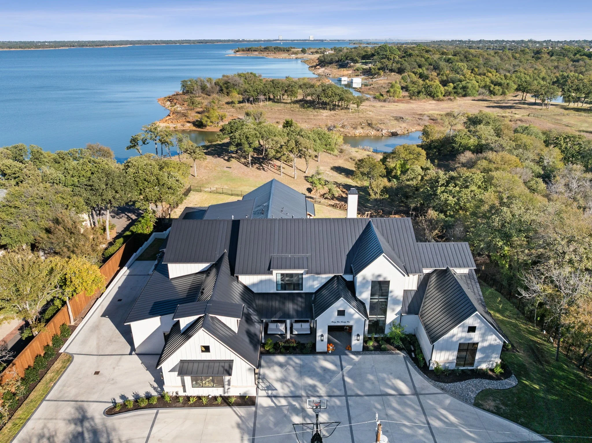 Aerial view of luxury custom home in Southlake, Texas built by WillowTree Custom Homes.