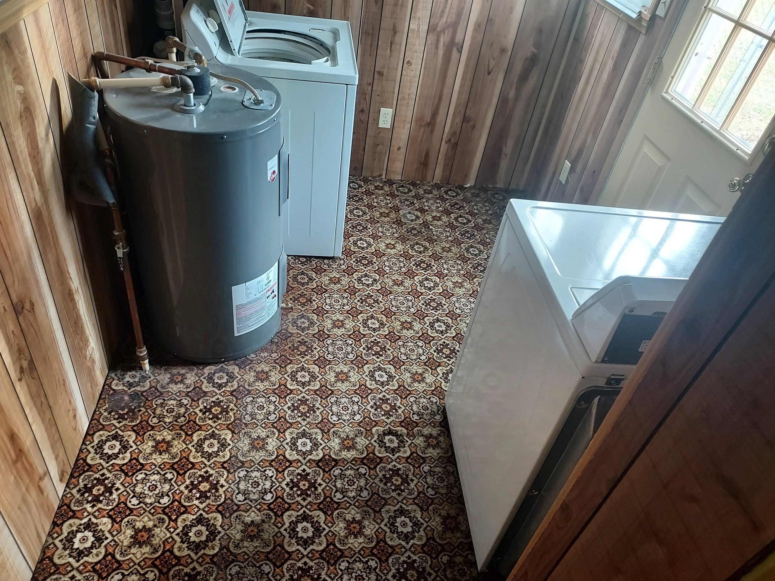 Before - Zanesville Laundry Room Vinyl Plank