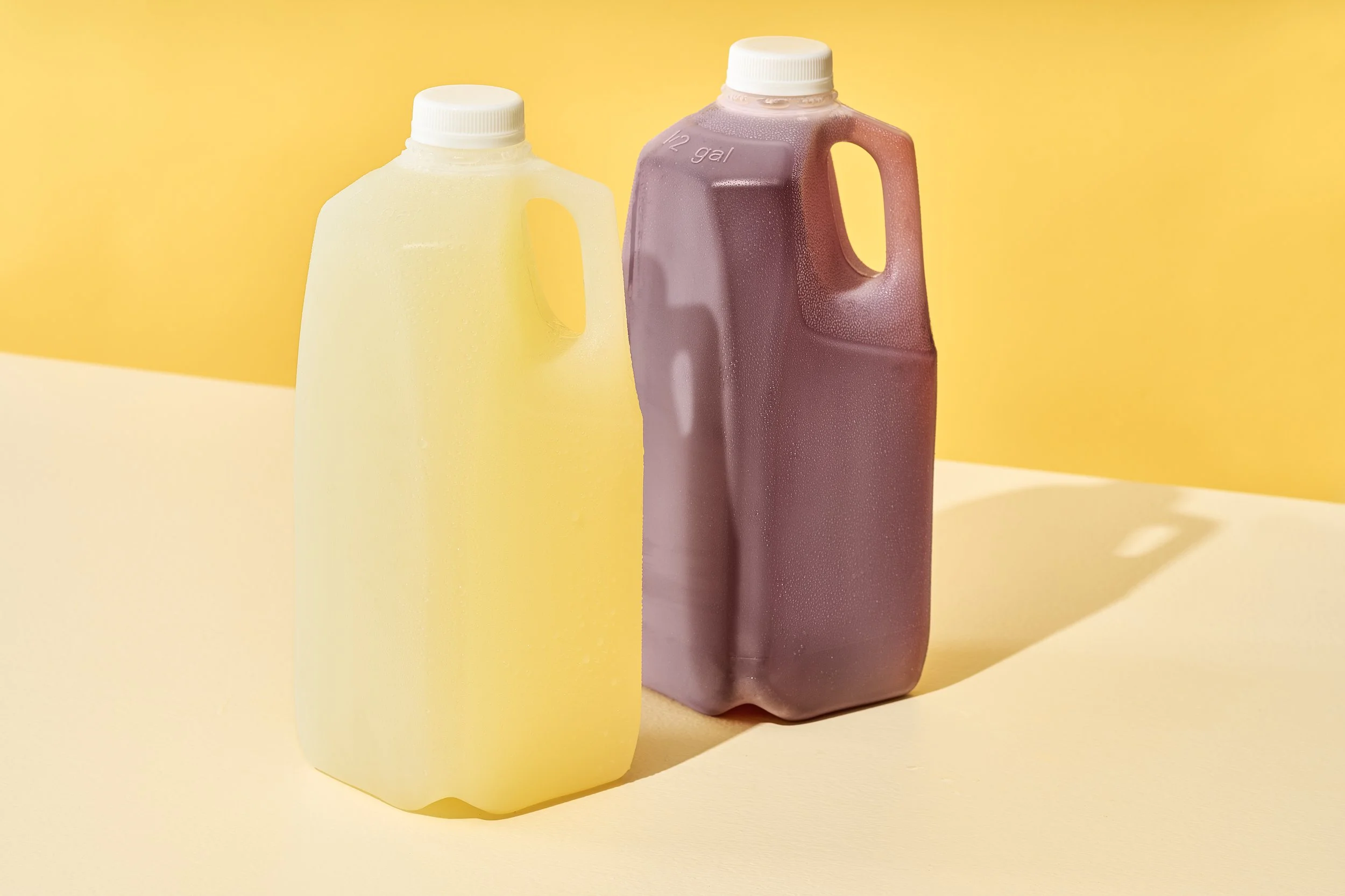 Two half-gallon jugs of lemonade and Petey’s Punch.