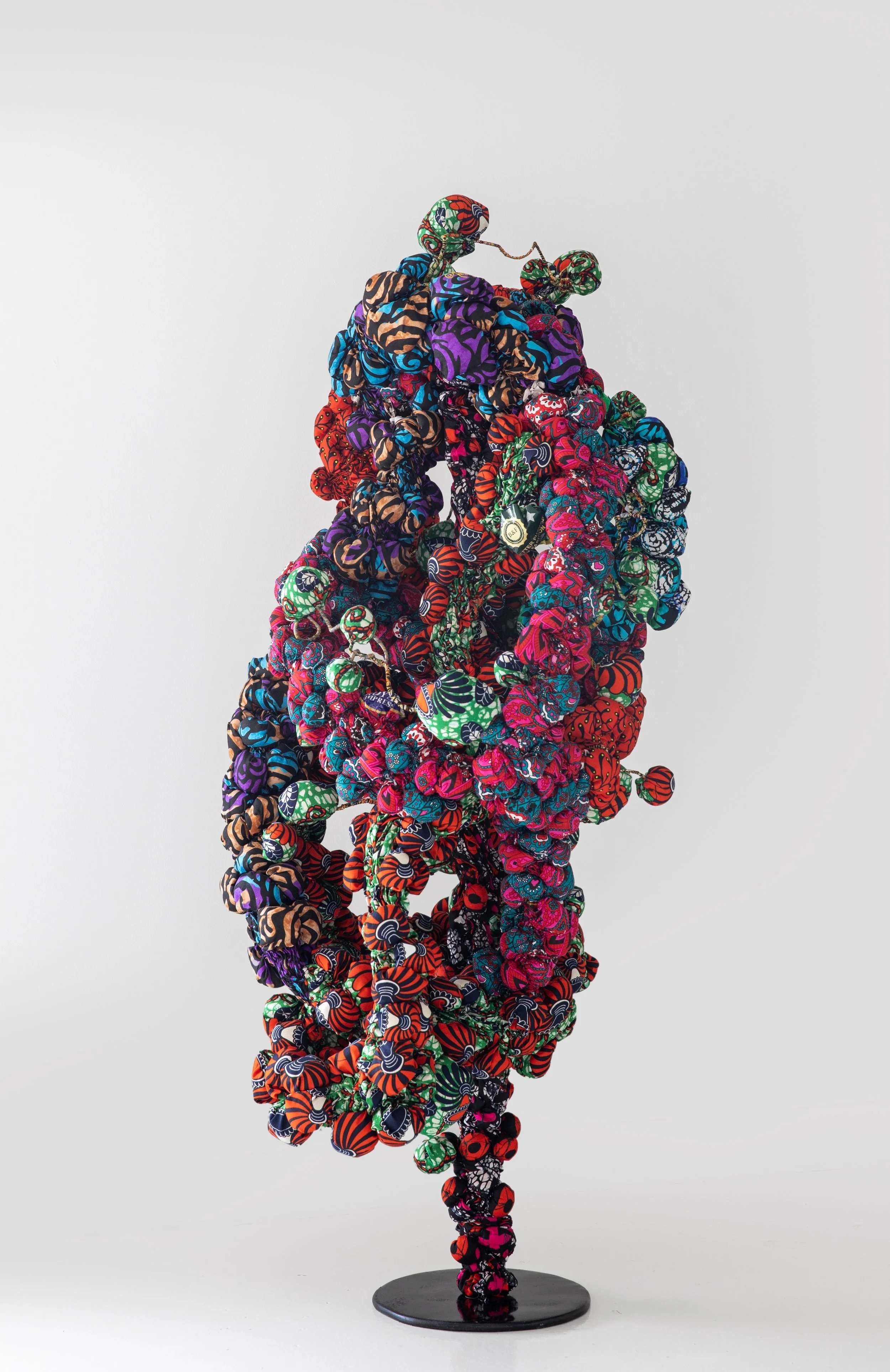 Fruits within, 2024,
African Print Fabric,
54" x 33 3/4" x 23 1/2