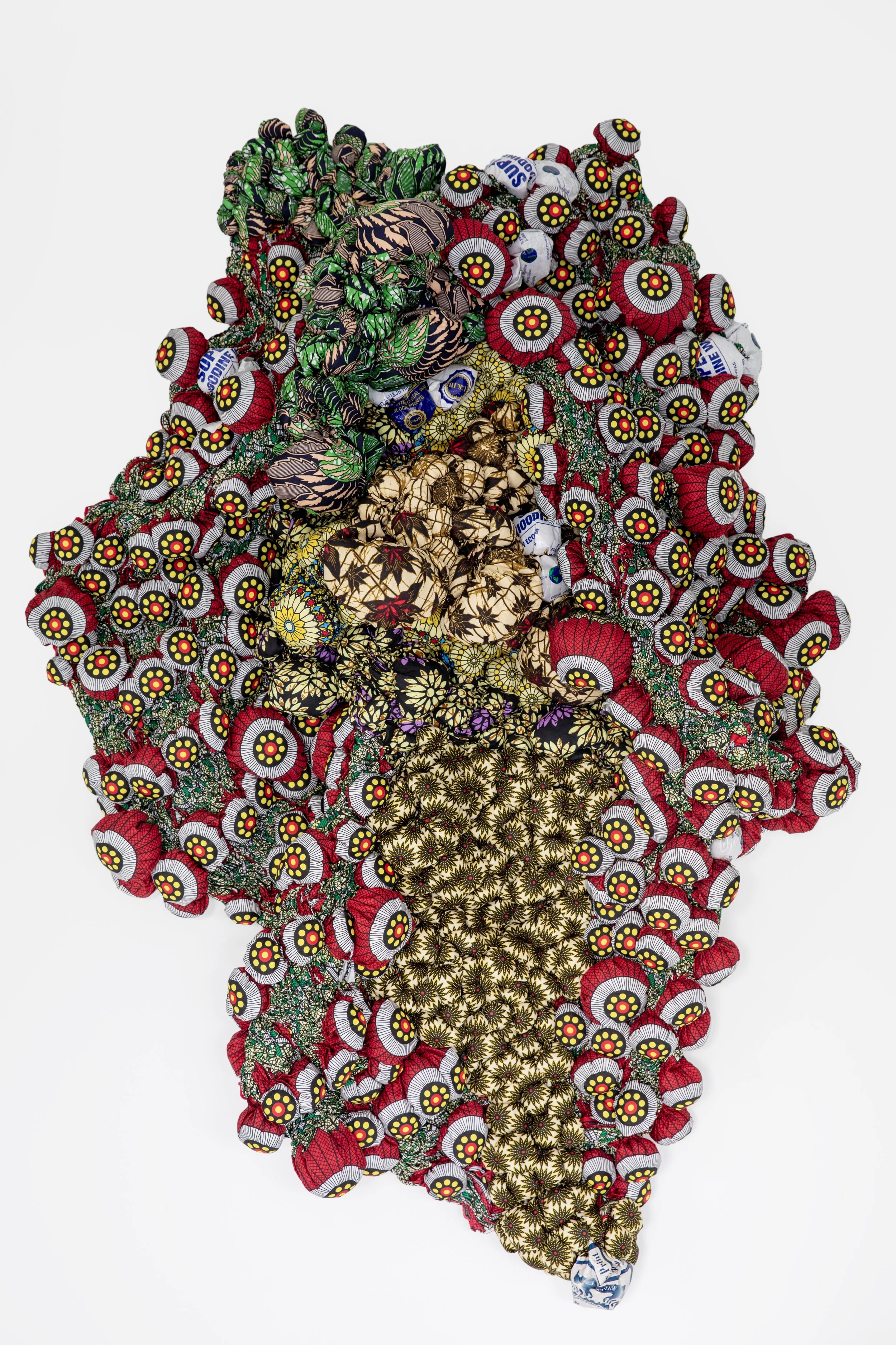 Momentum of building a Life, 2025,
African Wax Print Fabric,
43 3/4" x 64" x 14"