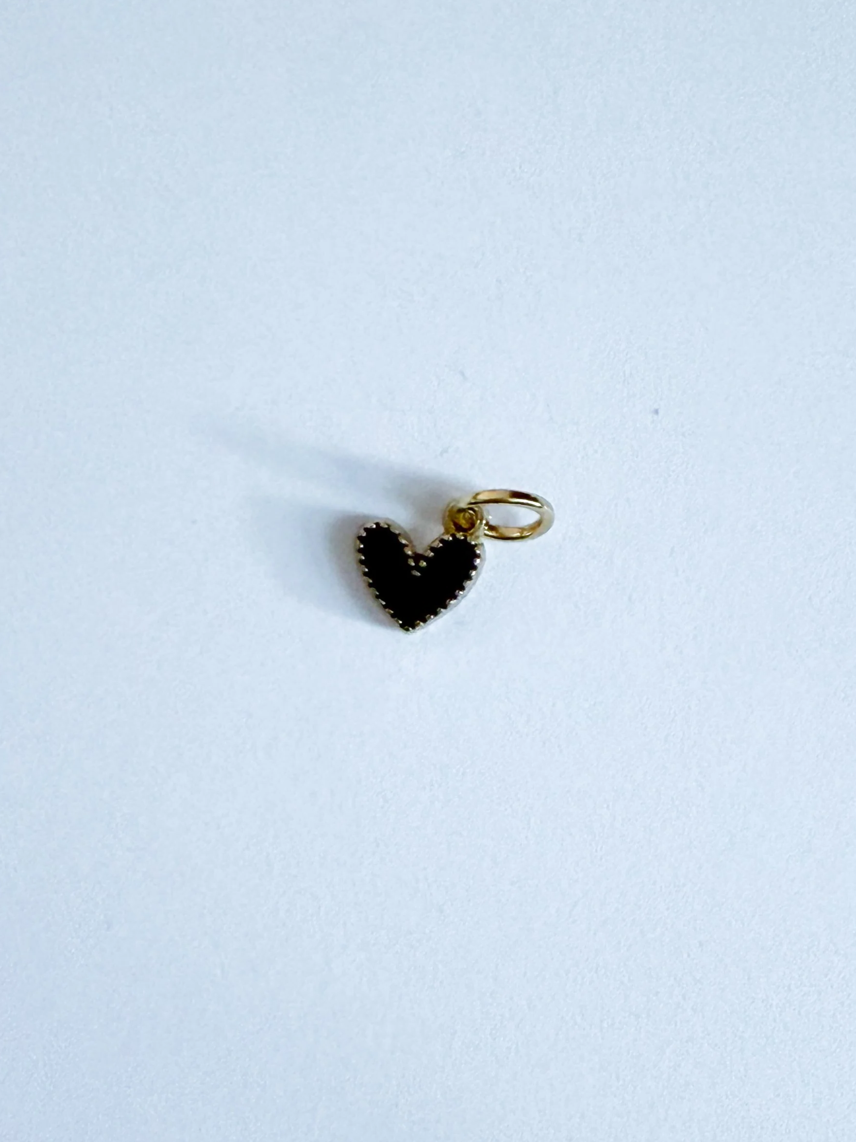 GOLD+TINY+BLACK+HEART+1.png