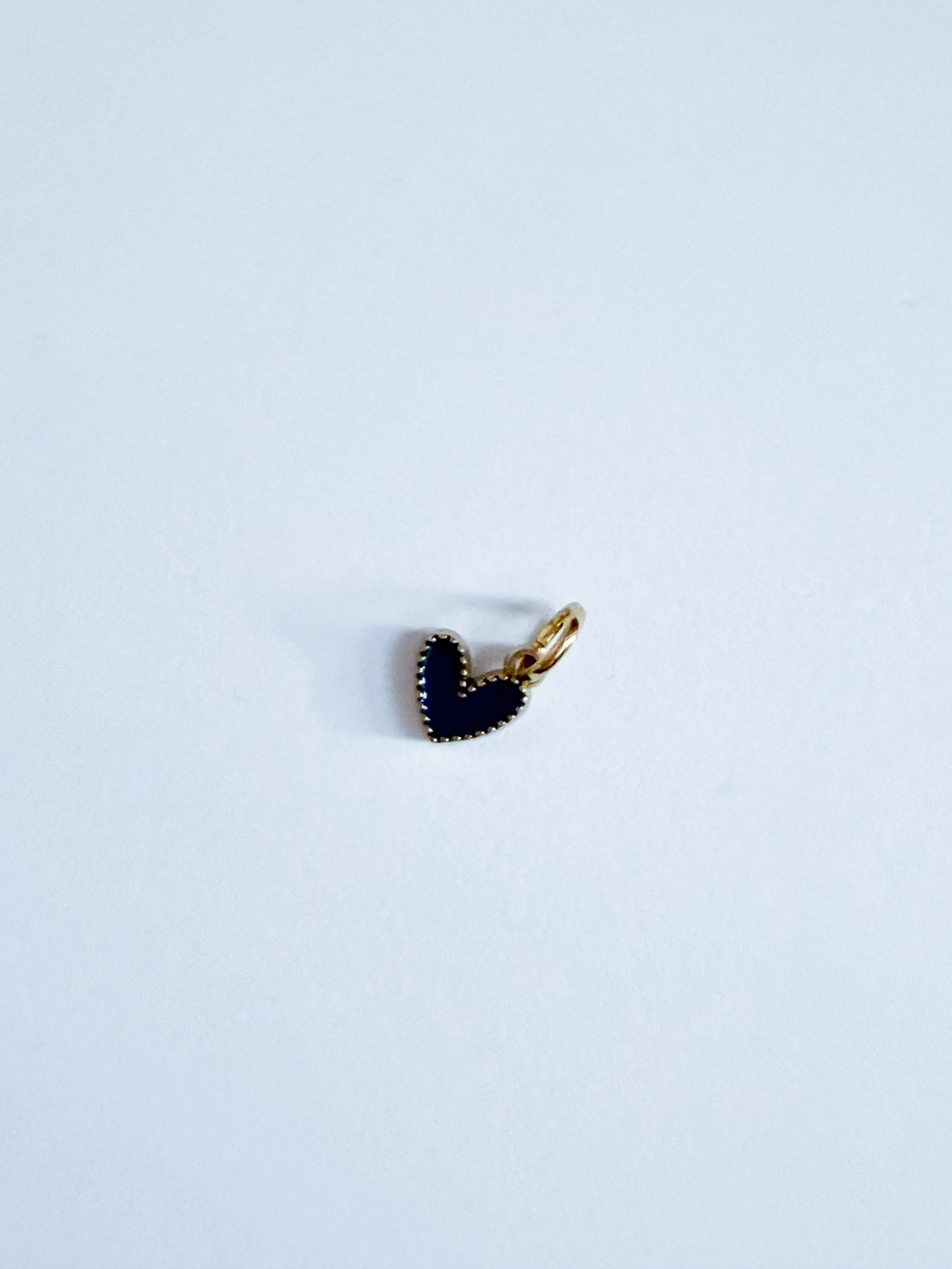 GOLD TINY BLACK HEART.JPG