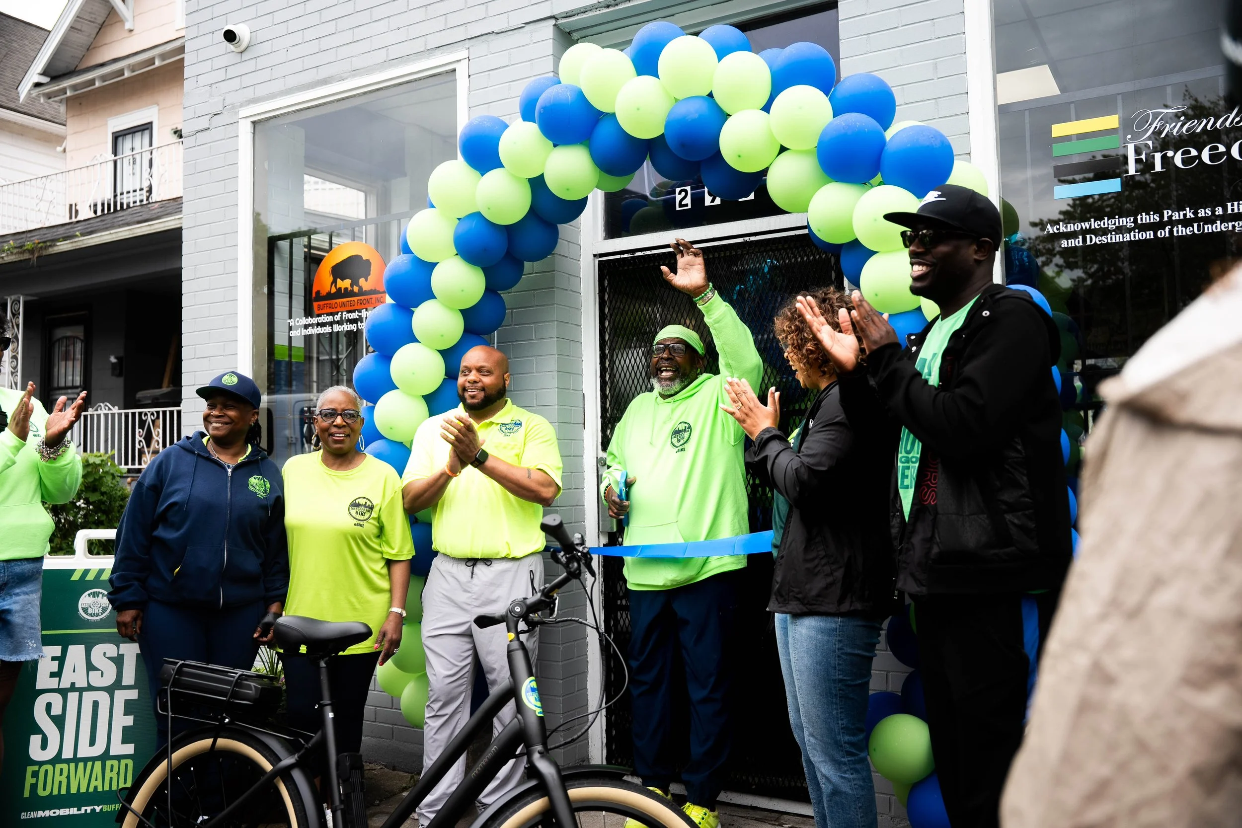 East Side Bike Club E-bike Library Grand opening — An image of the grand opening of East Side Bike Club's e-bike library and bike shop.