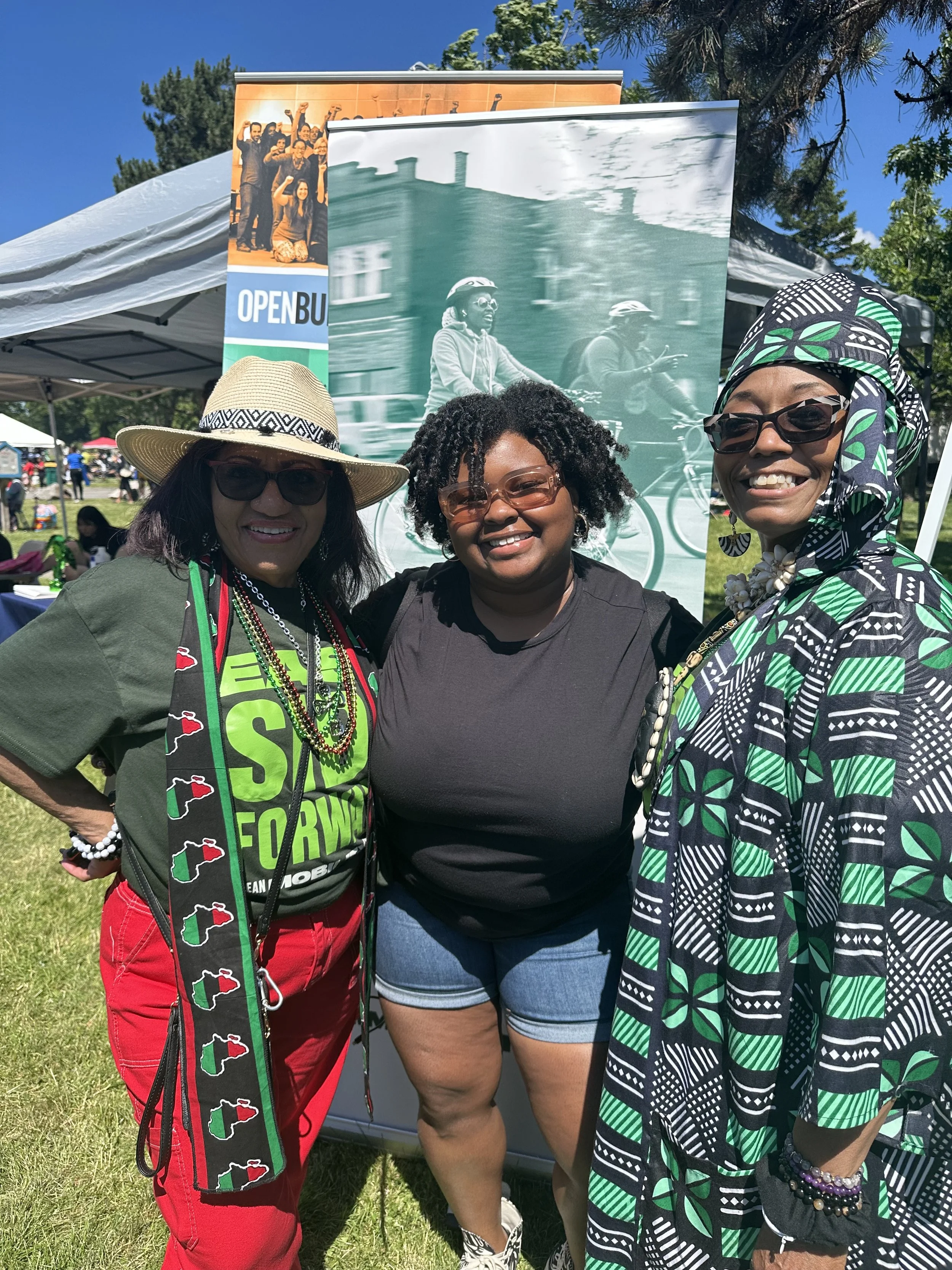 Neighborhood Leadership Group at Ride Reels — An image of three people smiling together.