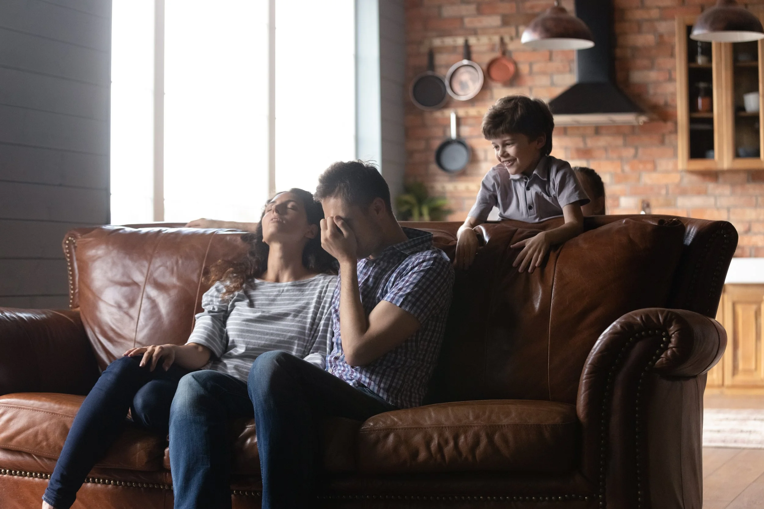 parents upset on couch.jpg