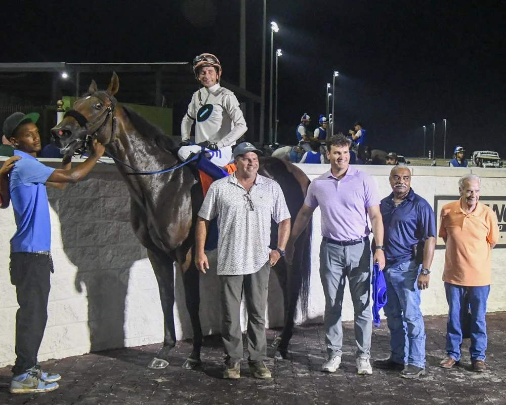 Set-Hut celebrating in the winners circle.