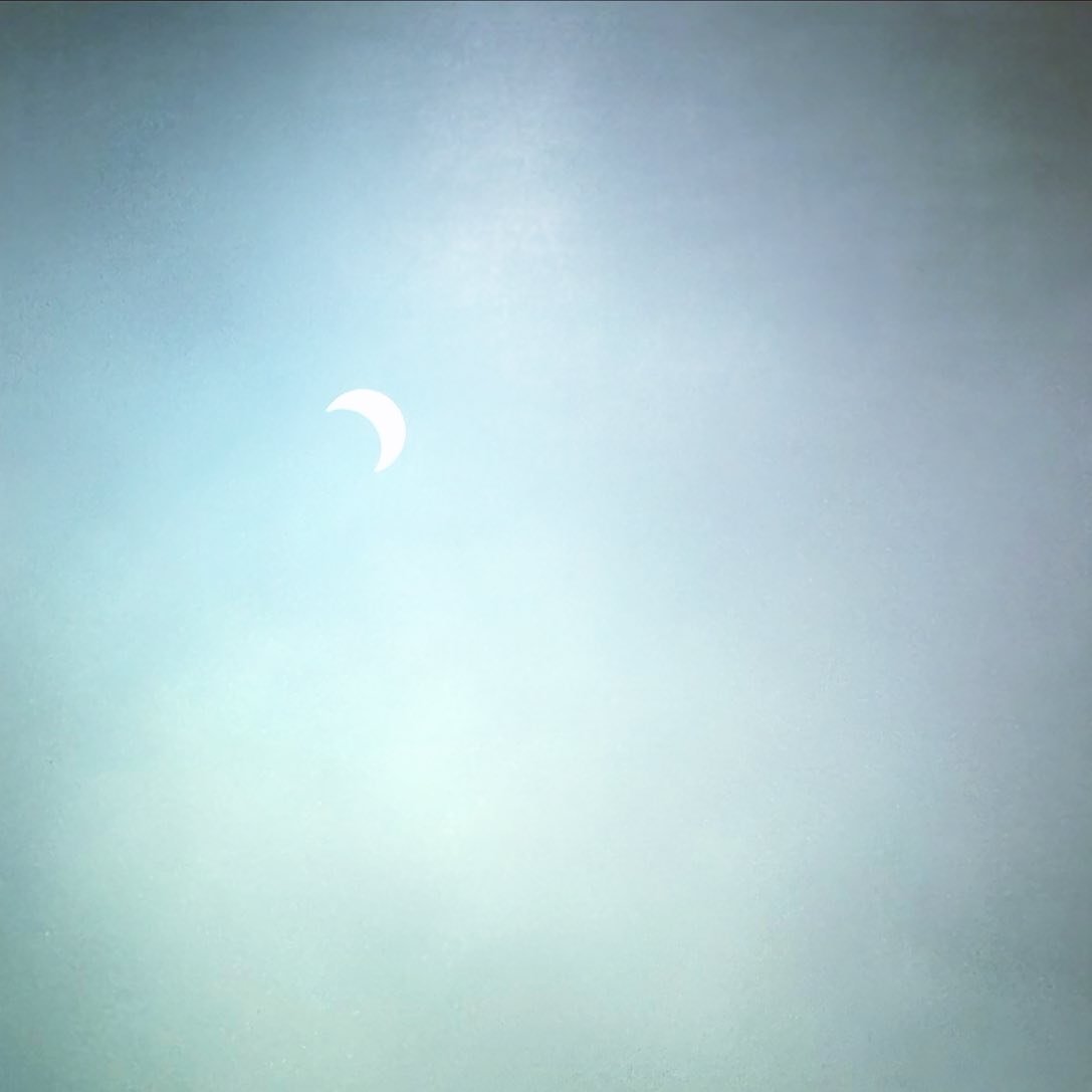 Did you get to see it today? #solareclipse2023  partial really, but cool. Got lucky with some cloud cover and was able to take this unprotected with my cell phone.