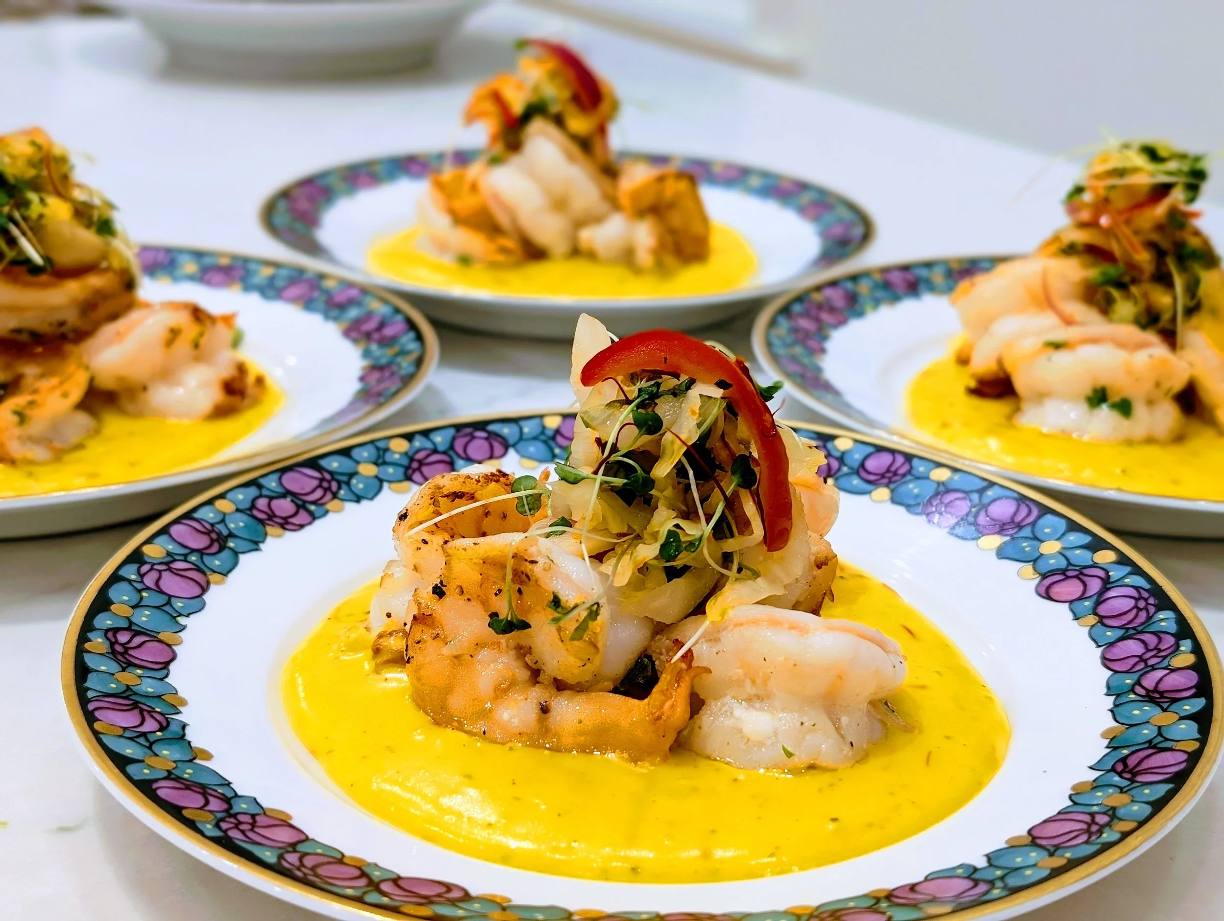 Sauté Gulf shrimp in a saffron cream sauce