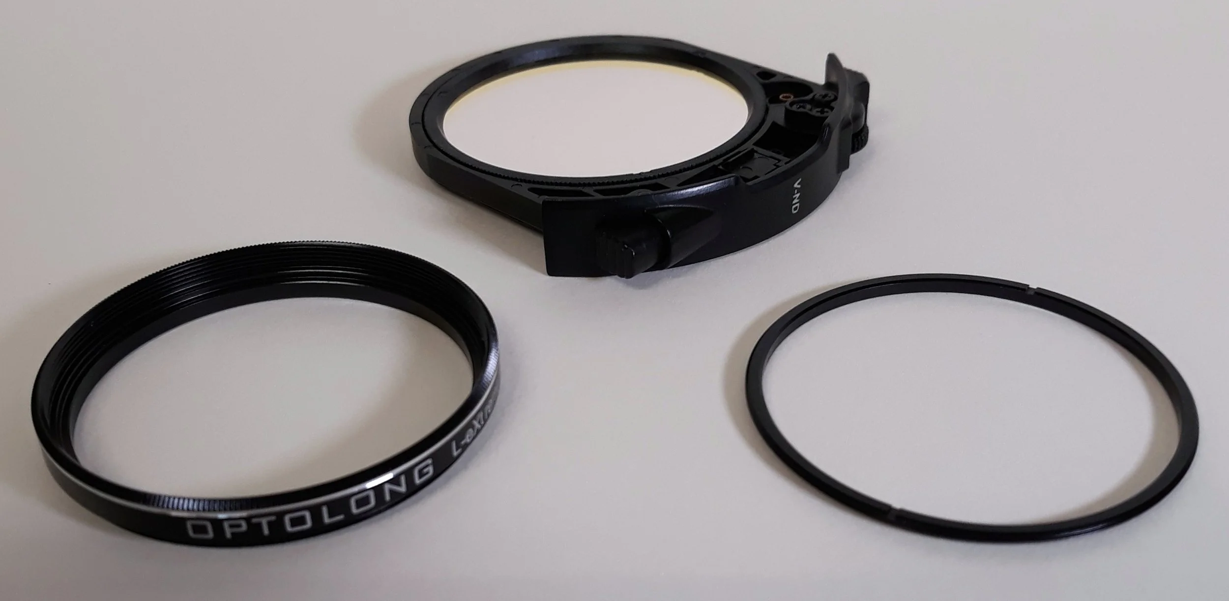 Canon RF-EF Lens adapter modified with dual-narrowband filter