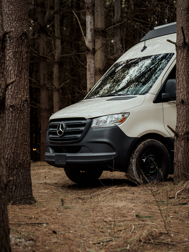 Sprinter van in the woods