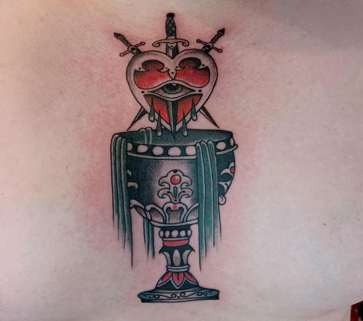 Heart Chalice by @jessicanoeltattoo 
For appointments, DM Jess or email jessicanoeltattoo@gmail.com 

#seattletattoo #ladytattooer #hearttattoo #chalicetattoo #swordtattoo #chesttattoo #traditionaltattoo