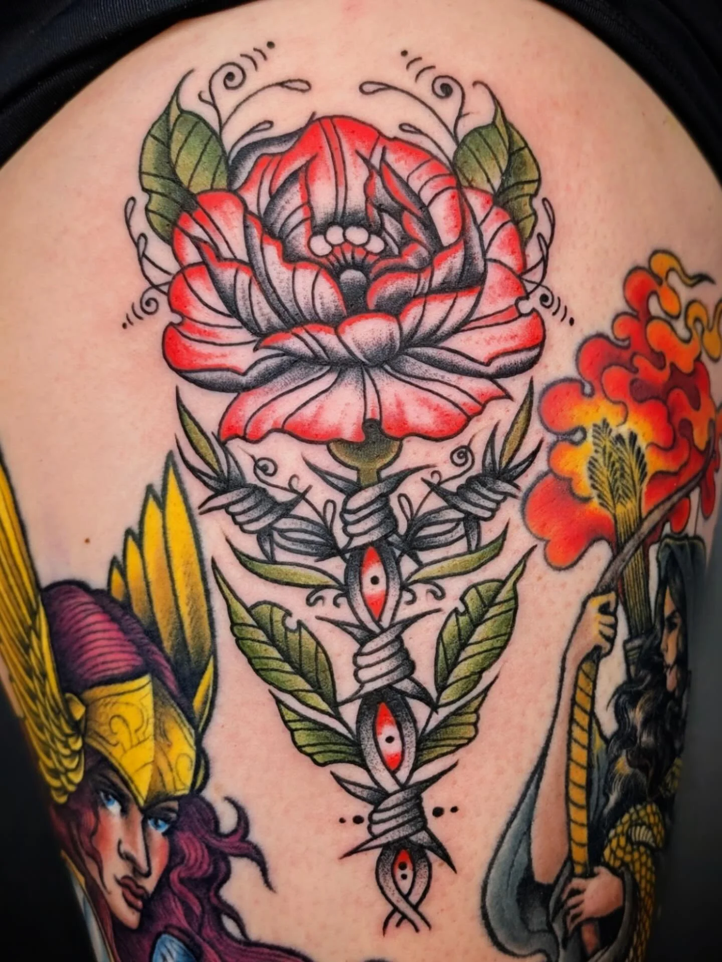 Barbed wire floral done by @jessicanoeltattoo 
Contact Jess directly for appointments!
.
.
.
#traditionaltattoo #seattletattoo #seattletattooartist