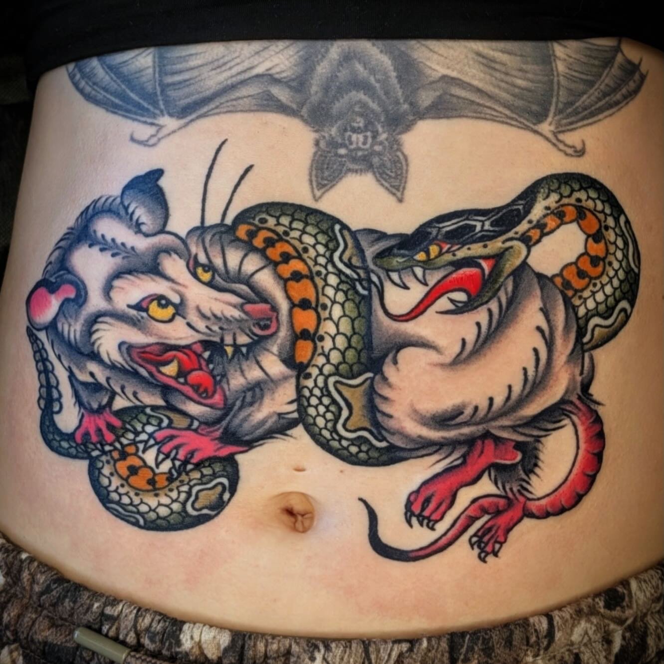 Possum rattlesnake battle done by @jessicanoeltattoo 
Contact Jess directly for appointments 
.
.
.
#seattletattoo #traditionaltattoo #seattletattooartist