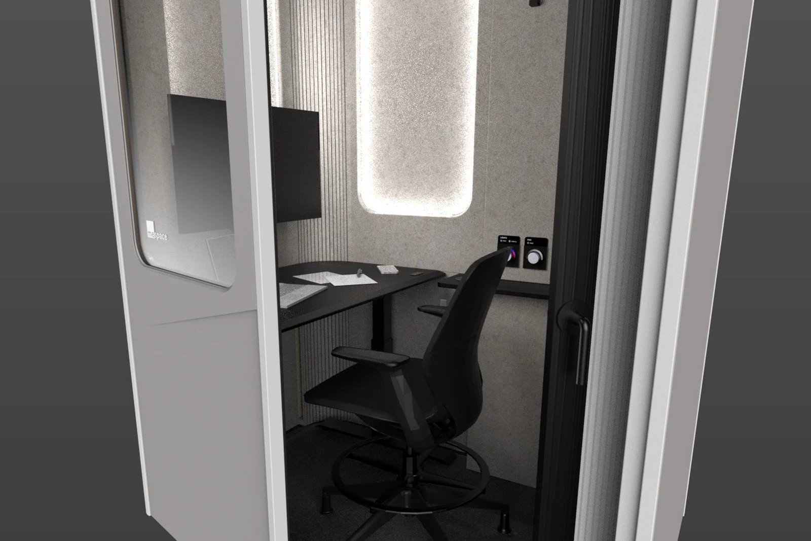 MeSpace interior seen through the open door, with the switchable privacy glass and desk.