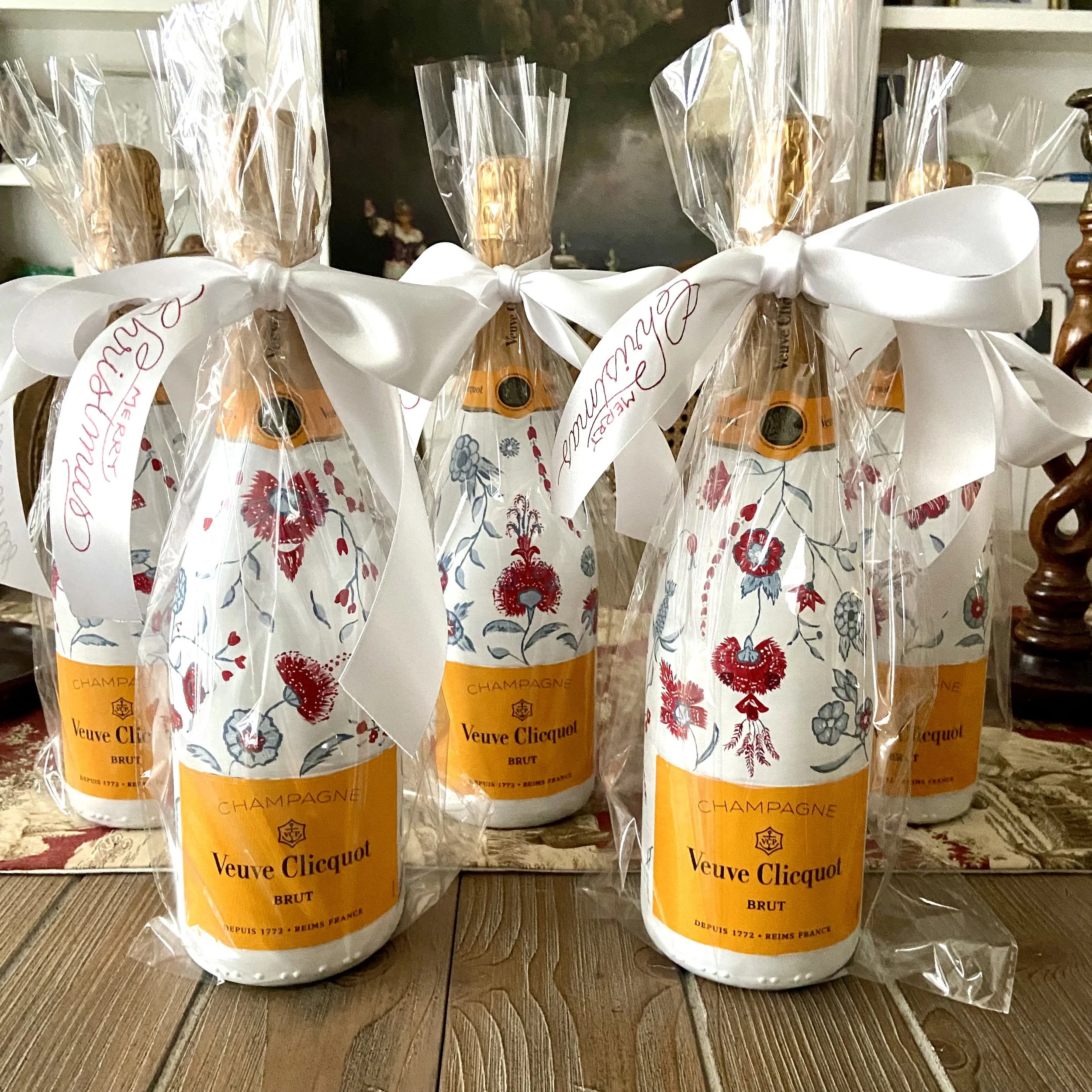 Red floral wallpaper bottles packaged.jpg