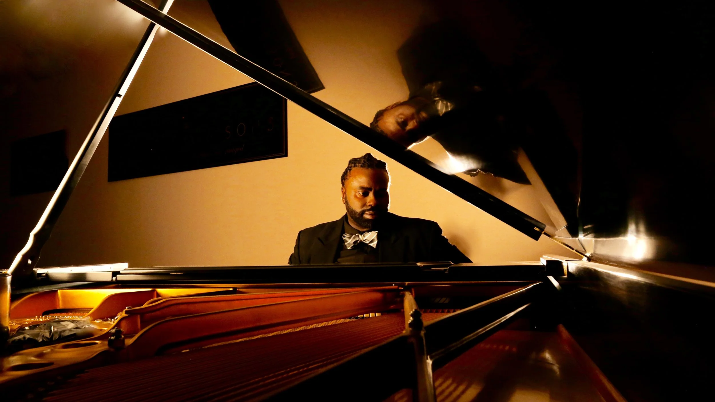 Jerry Compere Composing at the Grand Piano