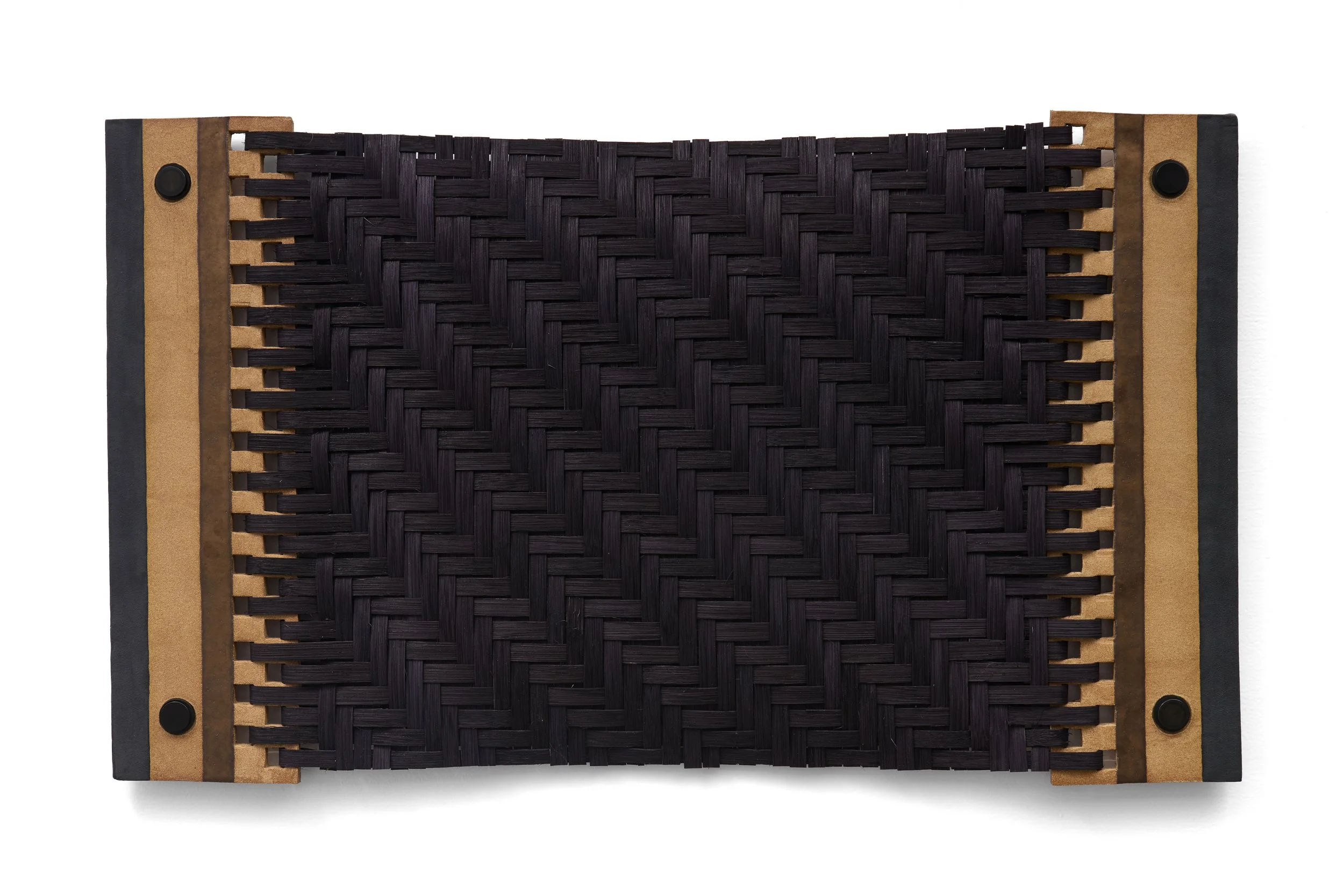 Armament IX, 2026, glazed ceramic, dyed rattan, stainless steel hardware, rubber gaskets, 19.25 x 32.5 x 1 inches.