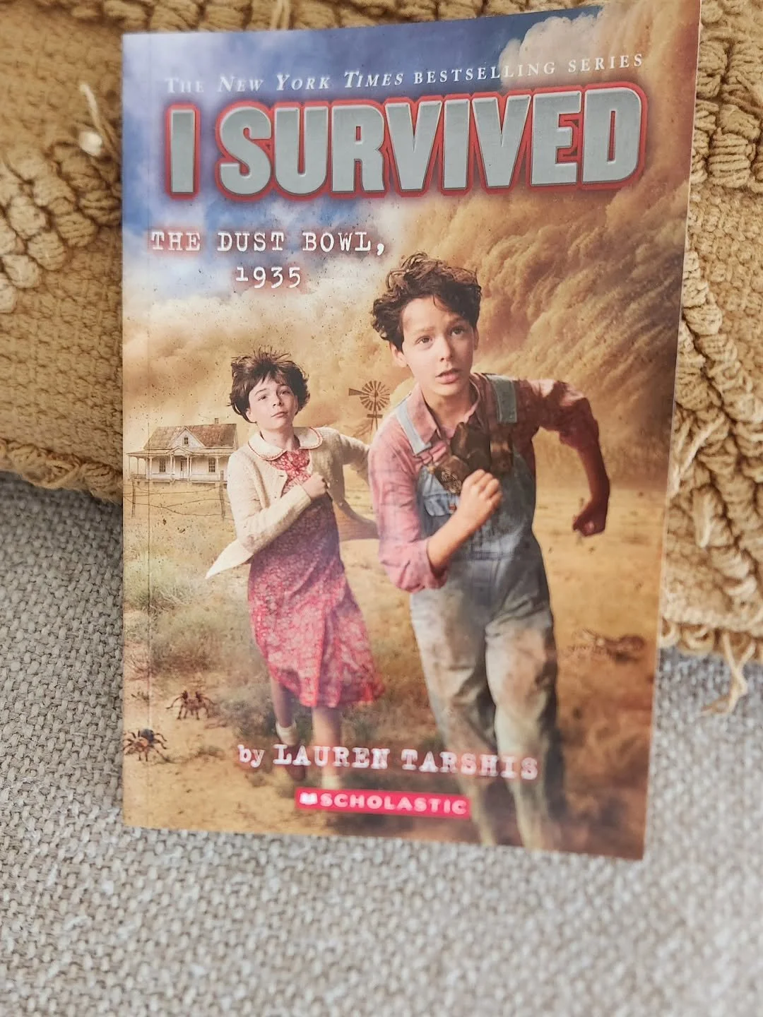 I Survived The Dust Bowl, 1935 by Lauren Tarshis 

What a powerful read! If you're looking for a fantastic family read, this is it. Each and every chapter had my son and I wanting more. What is usually a chapter or two read per night ended up being m