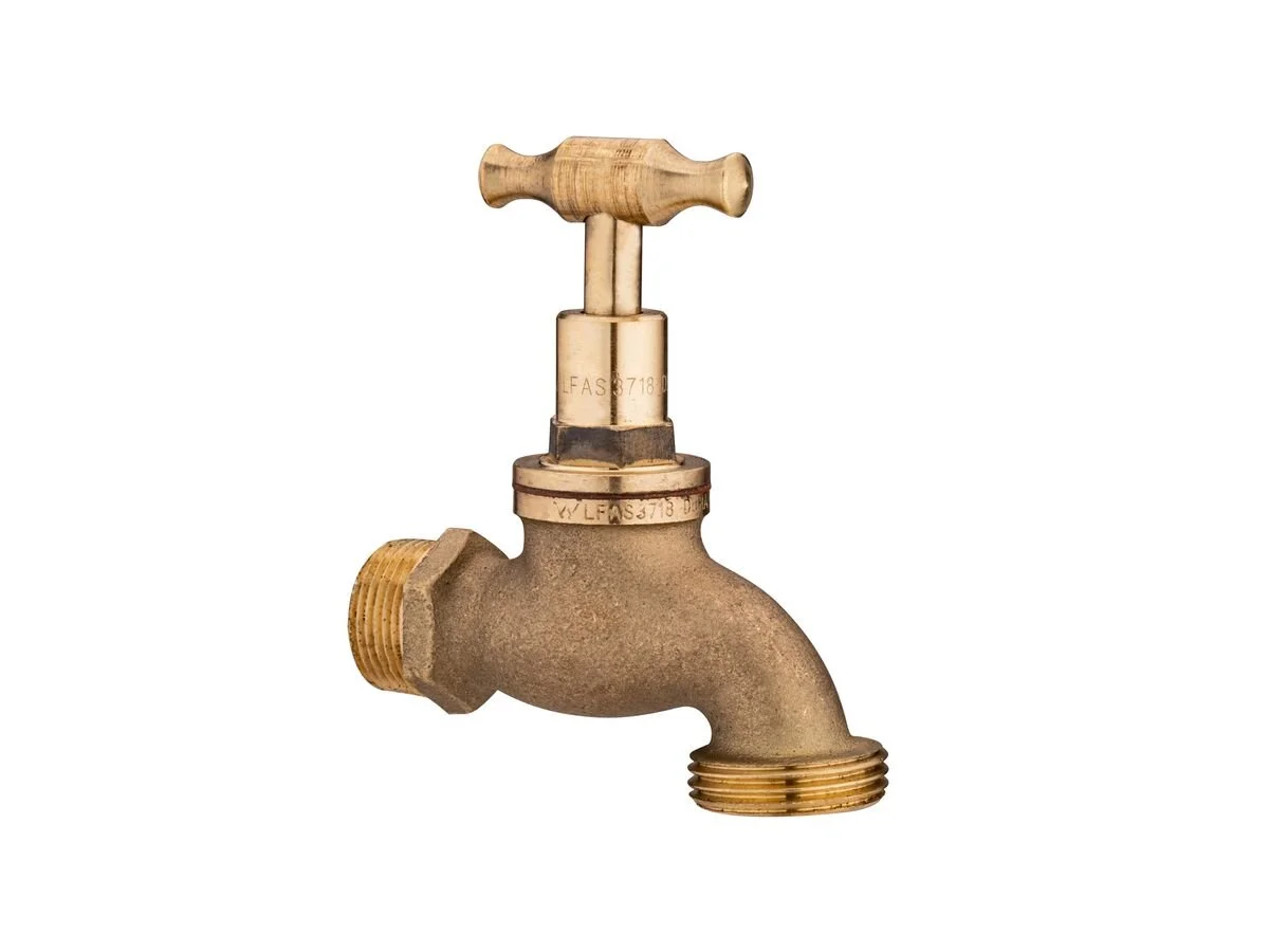 Brass water faucet with a wooden handle against a white background.