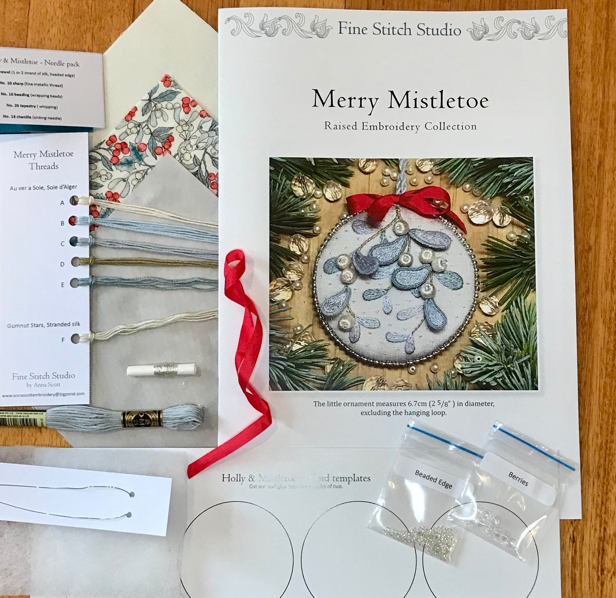 Stumpwork embroidery kit. Christmas ornament with sprig of mistletoe embroidered in silk threads. Kit contents.