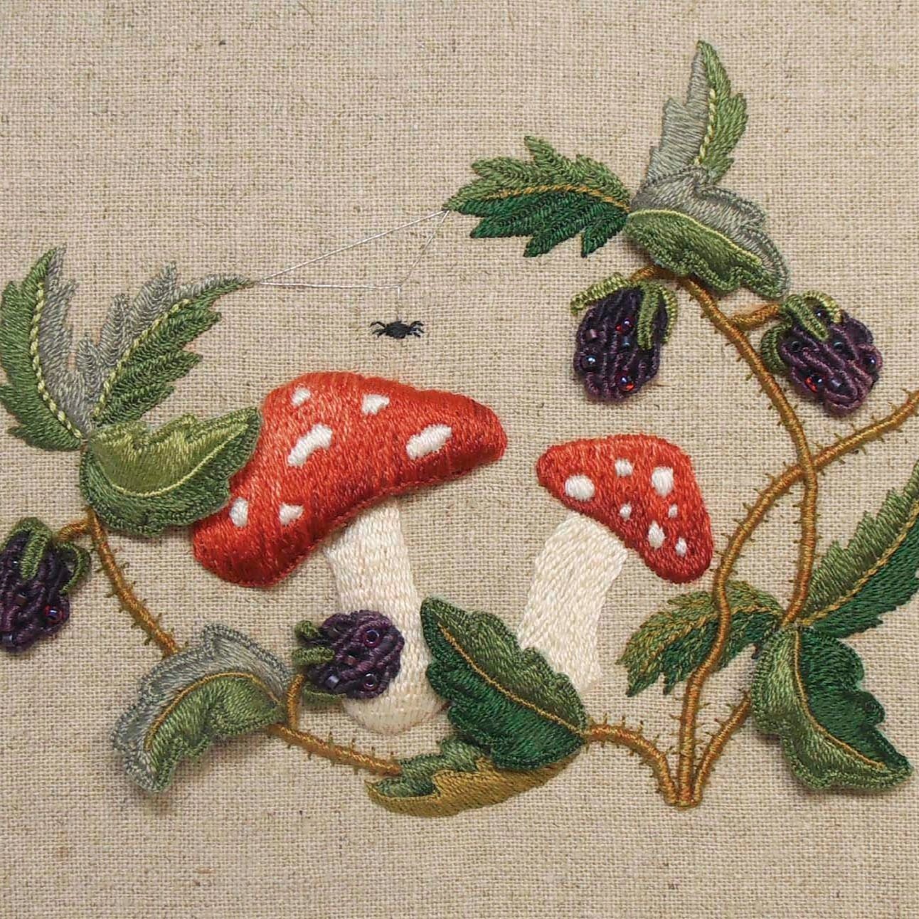 Raised embroidery design with toadstools & brambles.