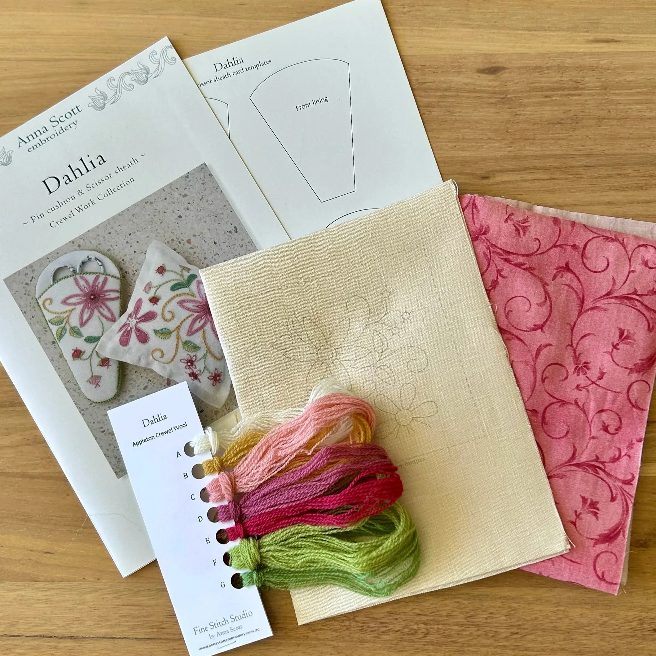 Crewel Embroidery DAHLIA kit contents. Instruction booklet, printed linen, crewel wool and backing fabric.