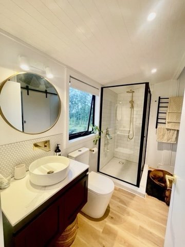The Bathroom // Featuring the shower frame, subway tiles on the shower walls and round mosaic's on the shower floor