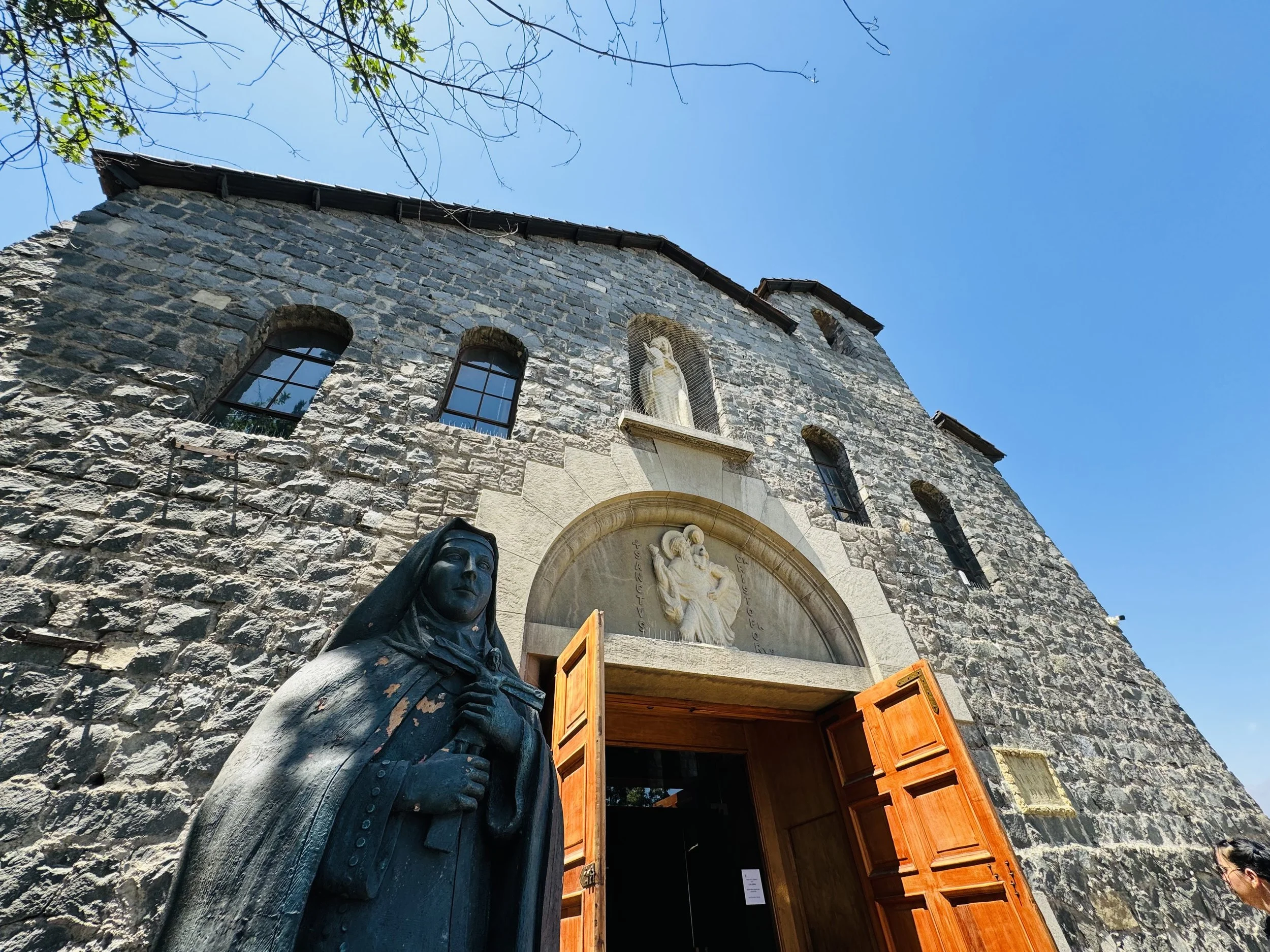 The Maternity of Mary Church on the hill to complement the giant statue.