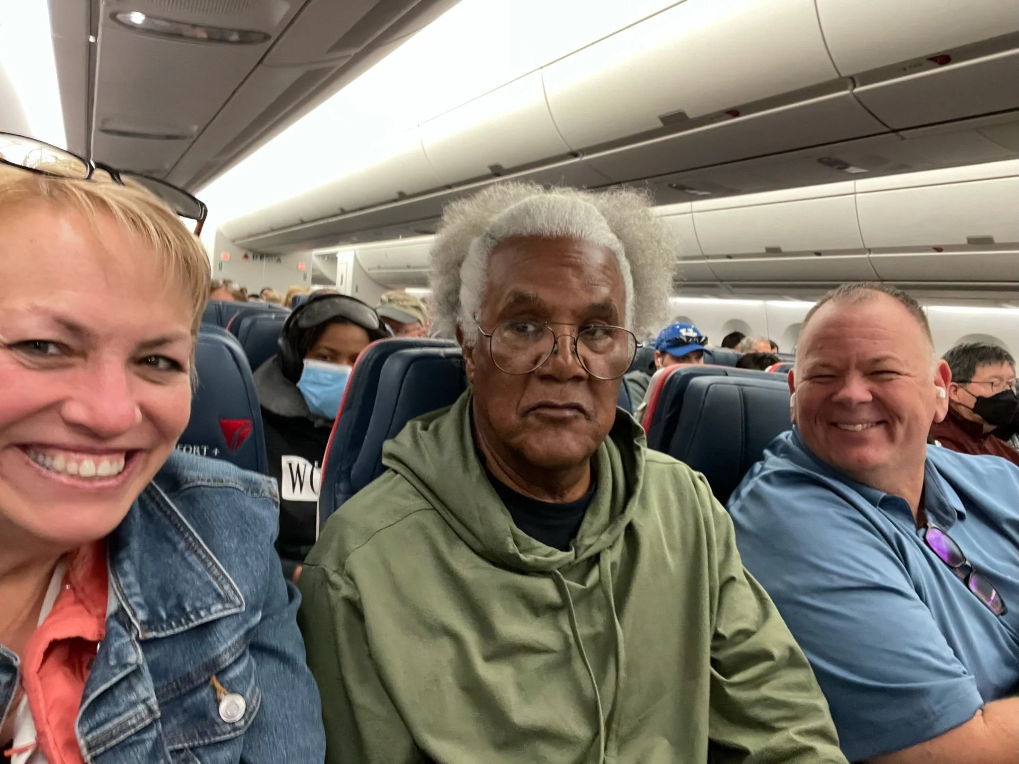 Our new friend excited to spend the next 9 hours between us from ATL to Santiago, Chile.