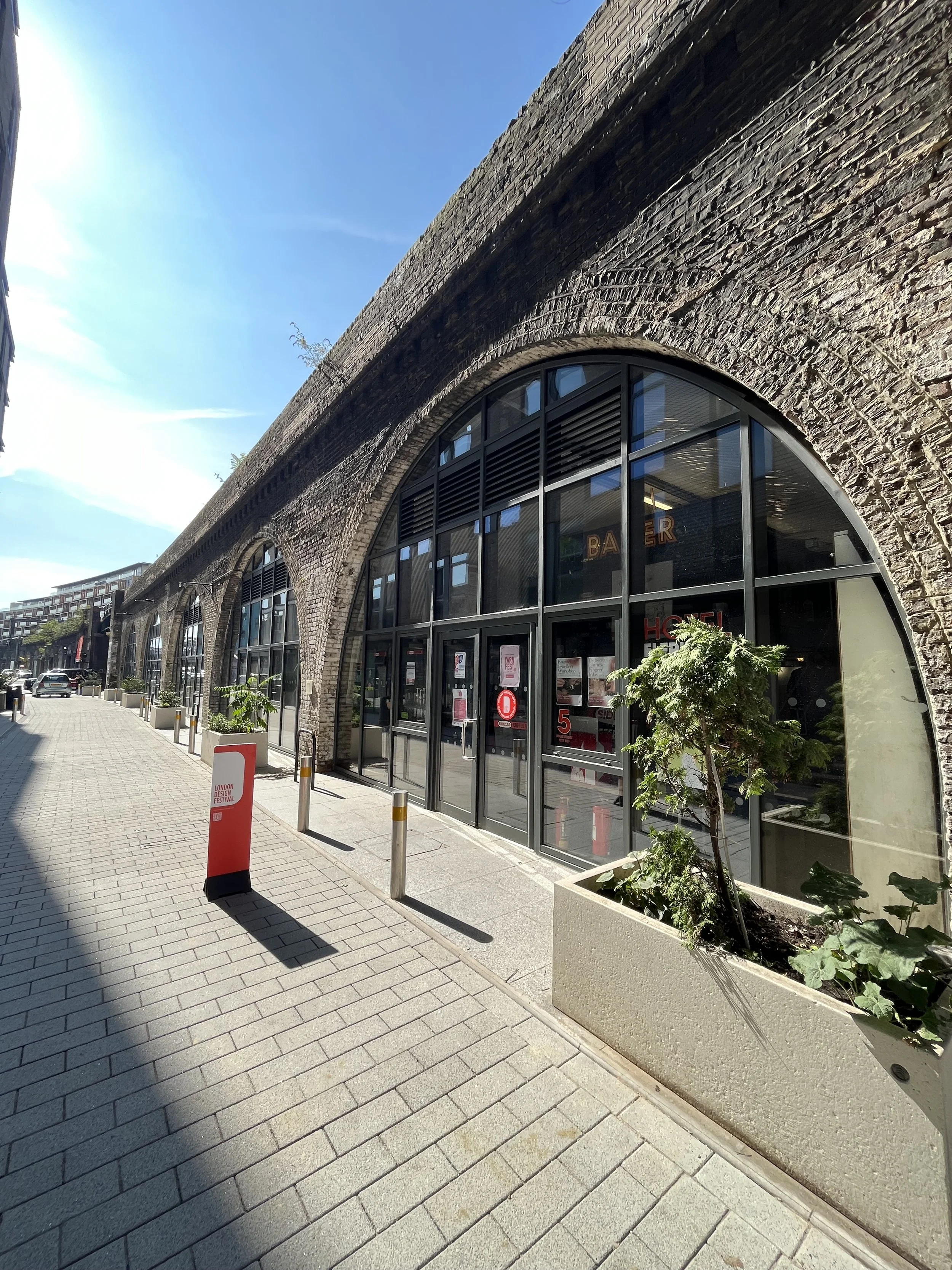 External view of arches on sunny day, at Spare Street London