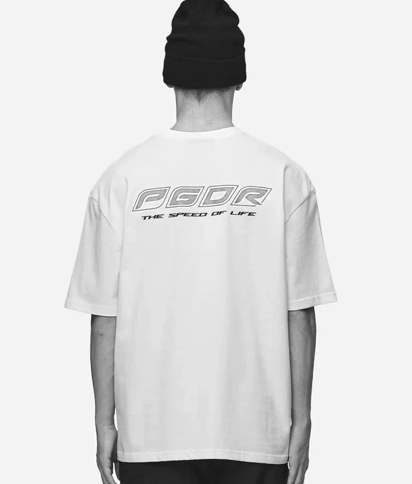 Back view of a person wearing a white PGDR T-shirt and a black beanie against a plain background.
