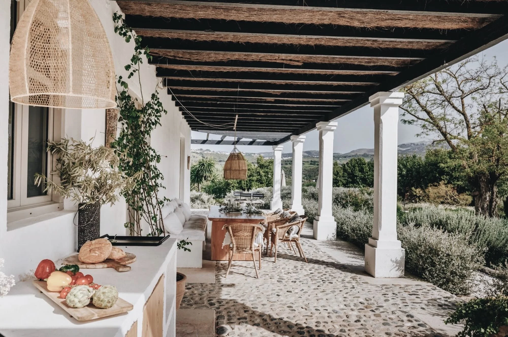 Outdoor BBQ and dining area at Finca La Marquesa, a luxury holiday home near Ronda in Andalusia
