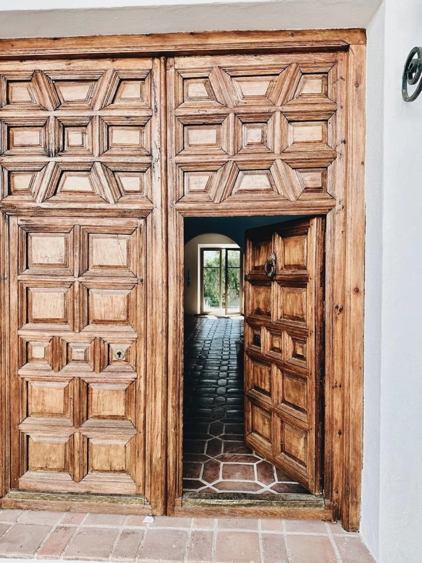 Authentic carved Spanish door at the entrance of Finca La Marquesa near Ronda in Andalusia