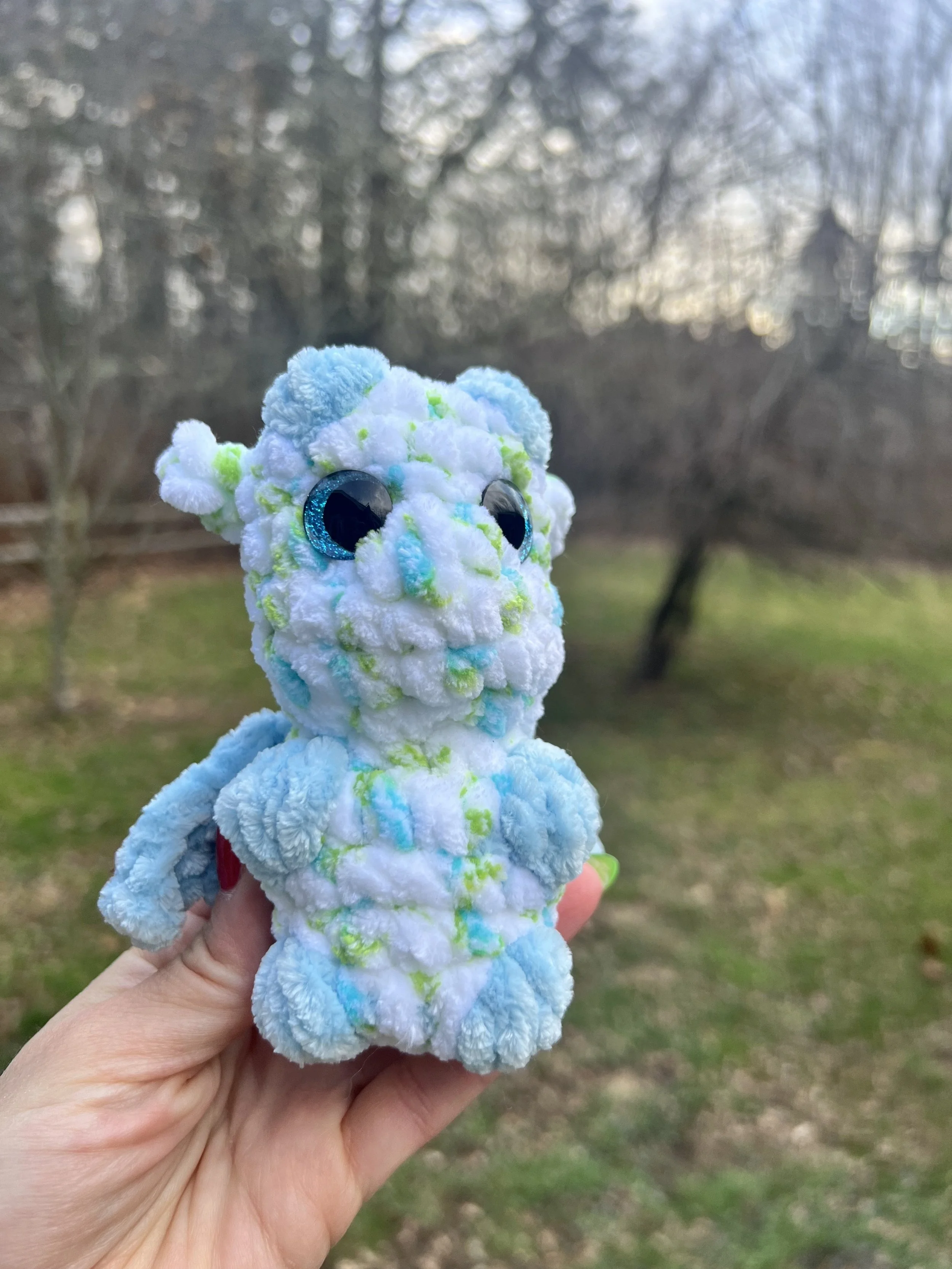 white dragon with blue wing 1.jpg