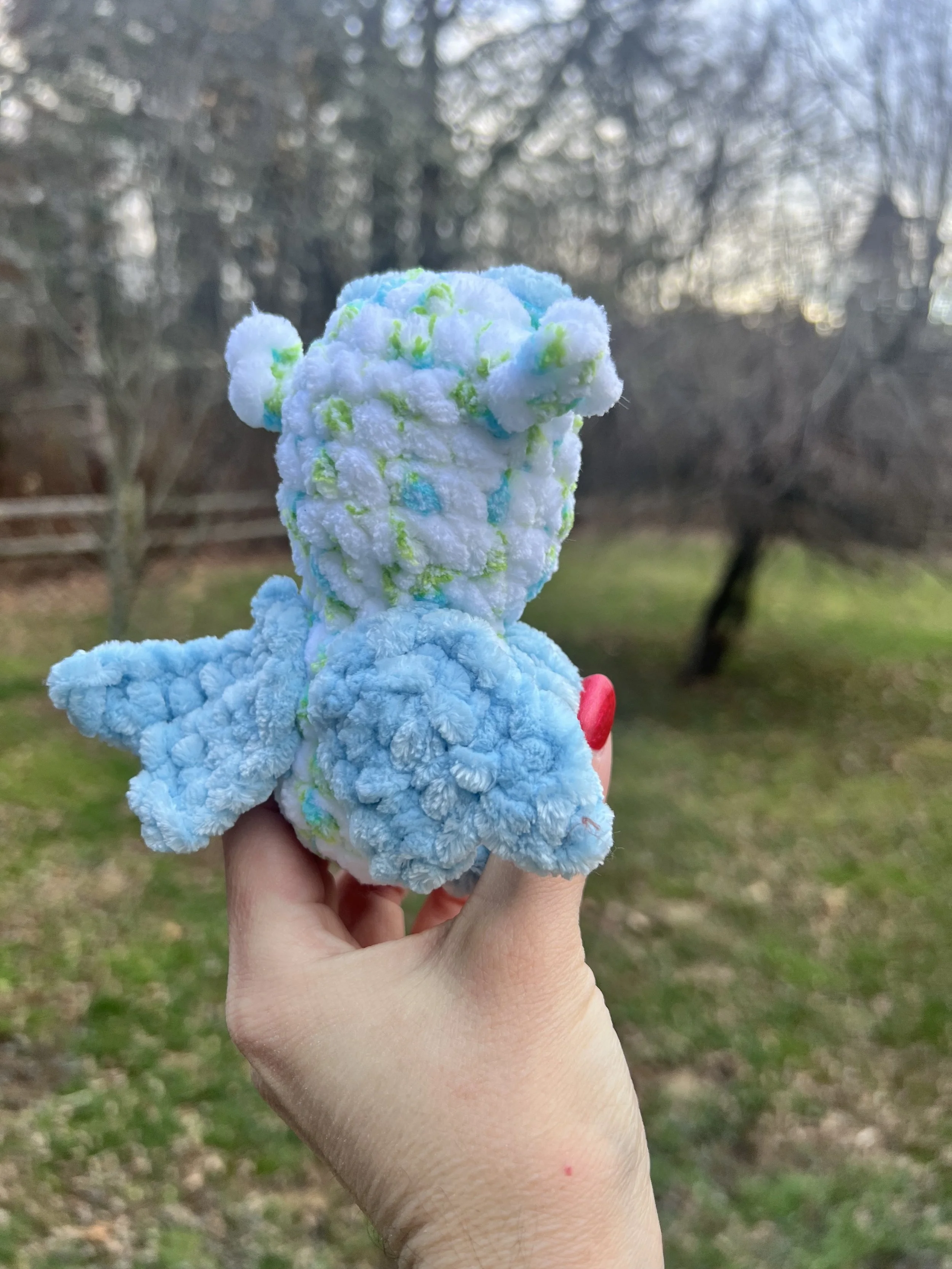 white dragon with blue wing 2.jpg