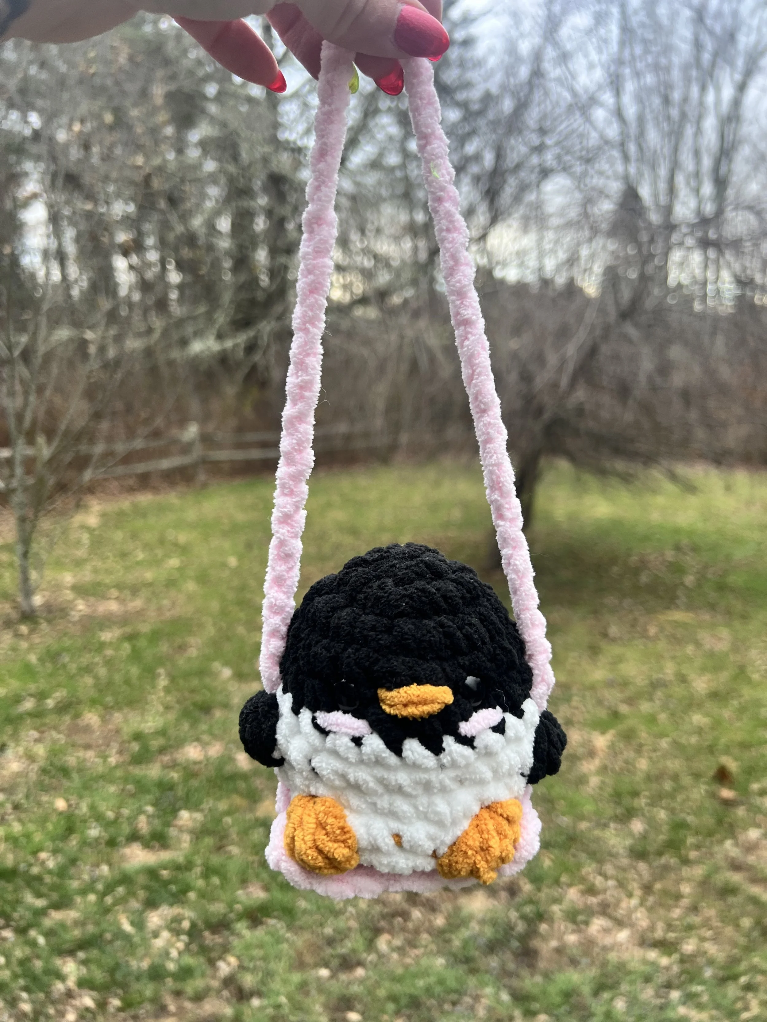penguin pink swing.jpg