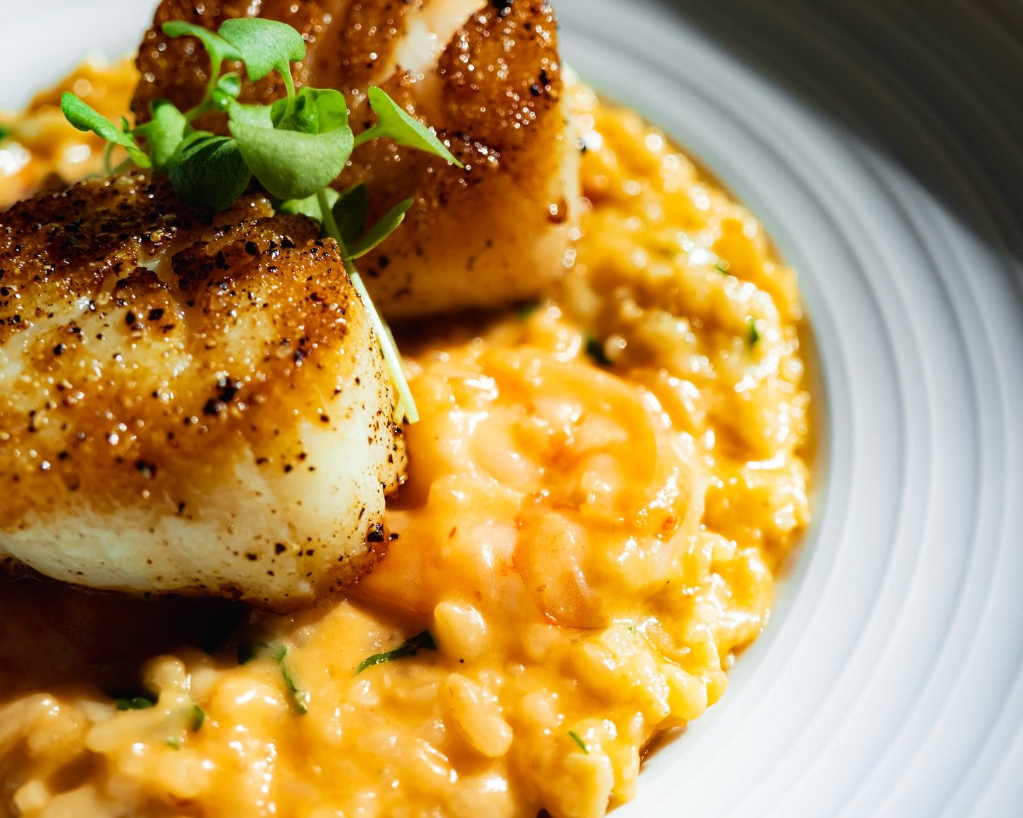 Picture a bowl of rich and creamy risotto. 
It is decadent and it is piping hot.
Full of scallops seared to perfection, with a delicate texture, lightly golden brown. 
The shrimp are crisp, tender and lightly briney. 
We hope you&rsquo;re hungry. 

?