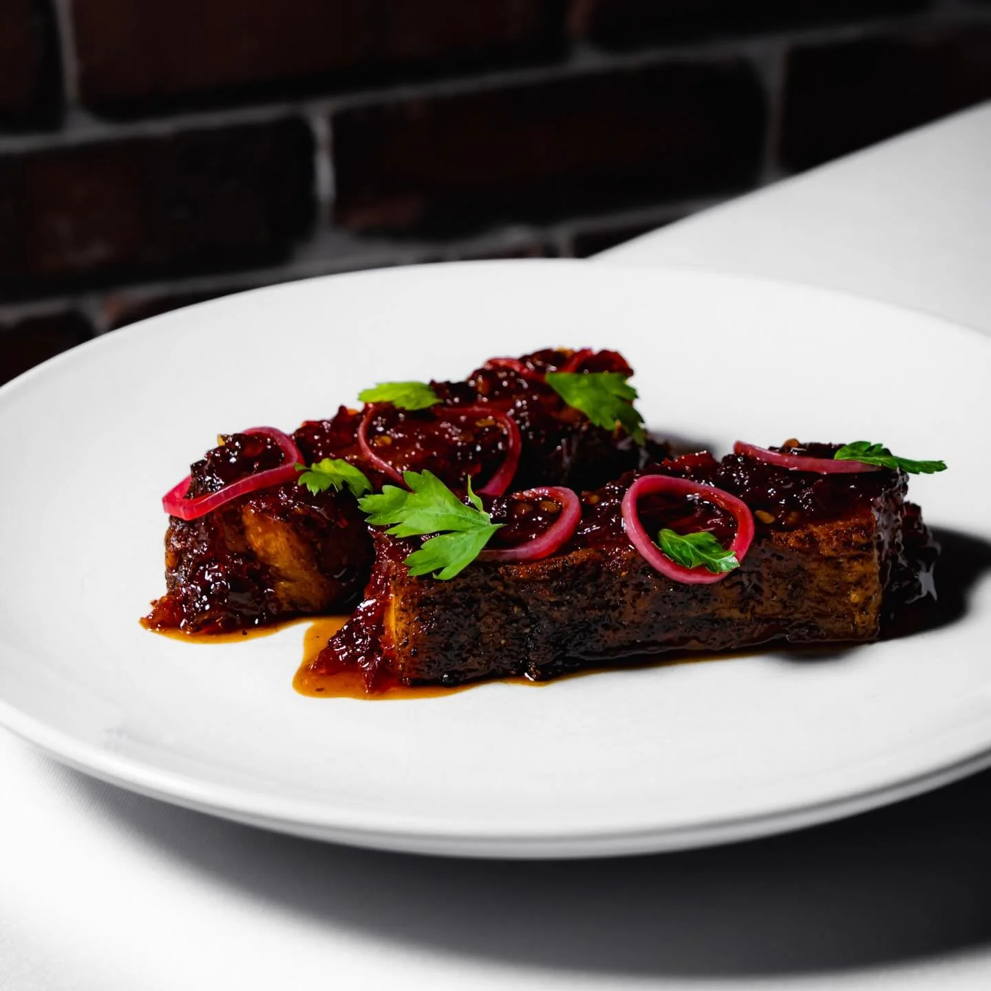 A cold night and a plate of hot, crispy, savory pork belly?! 
Yea, that sounds like the plan!

📸 @billylogancreative 

#downtownILM #wilmingtonNC #wilmingtoneats