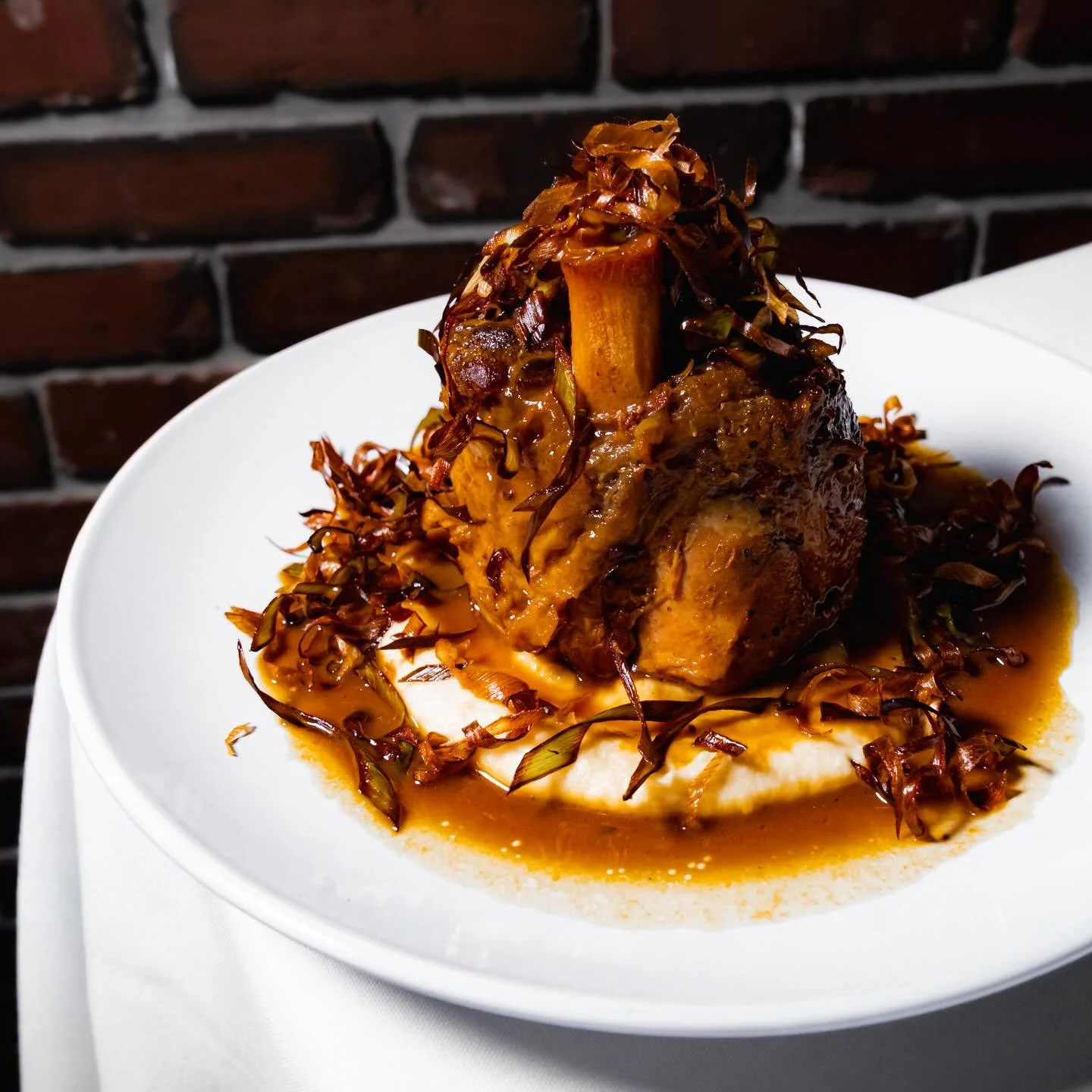 Well it&rsquo;s chilly! But, you don&rsquo;t have to be!
Come warm up with us and a delicious pork shank this weekend. 

📸 @billylogancreative 

#downtownILM #italianfood #wilmingtonNC #FlorianaILM wilmingtoneats