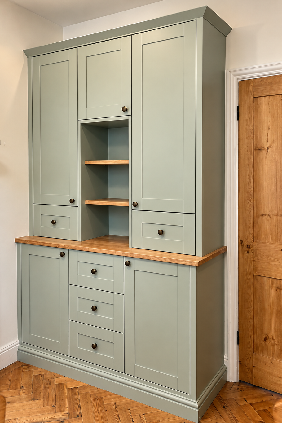 light olive sage green dresser unit with cupboards and drawers