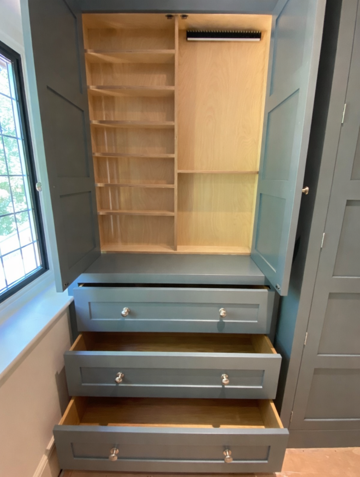 made to measure wardrobe with bespoke shelving using birch plywood and solid oak drawers
