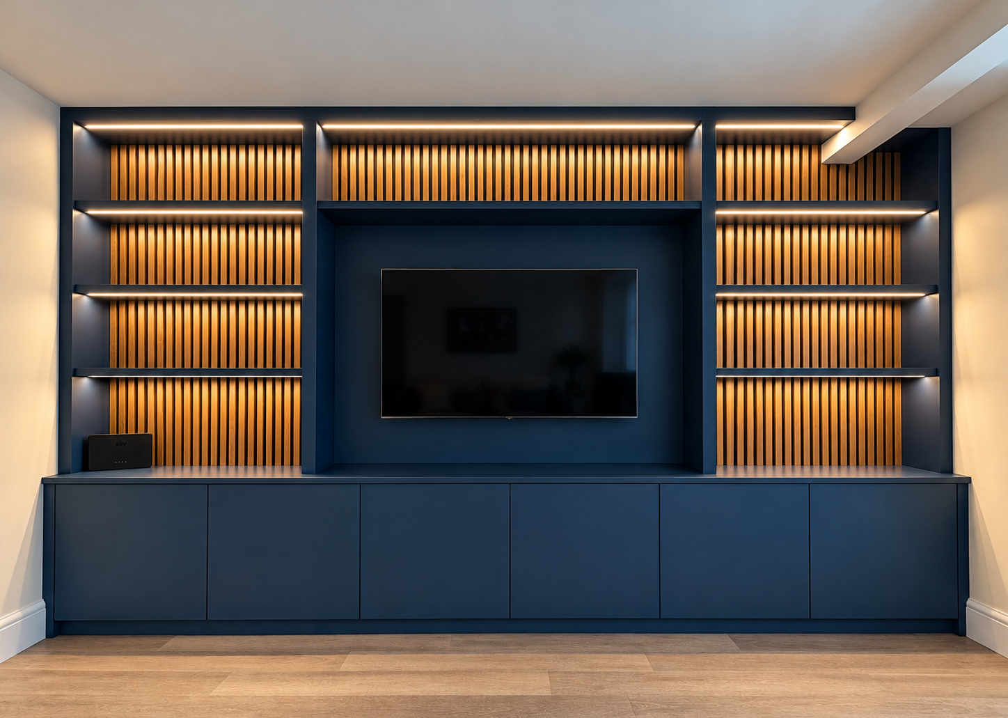 Navy Media Wall with Warm Wood Slats.png