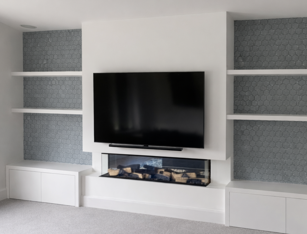 White built-in shelves and cupboards for media wall