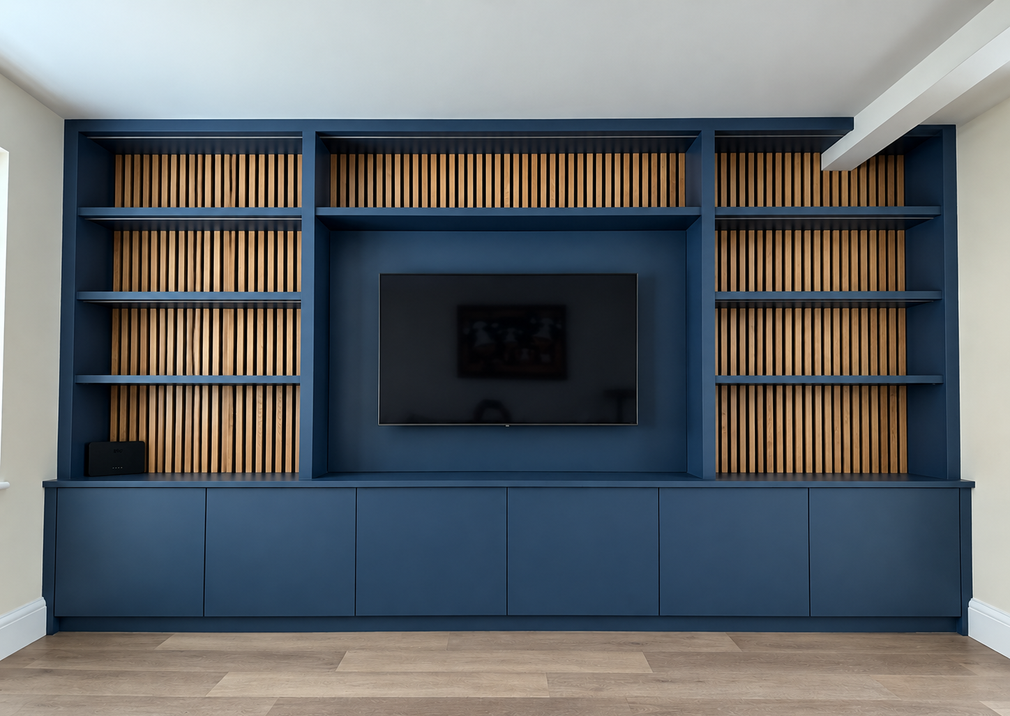 Modern Navy Media Wall with Oak Slats.png