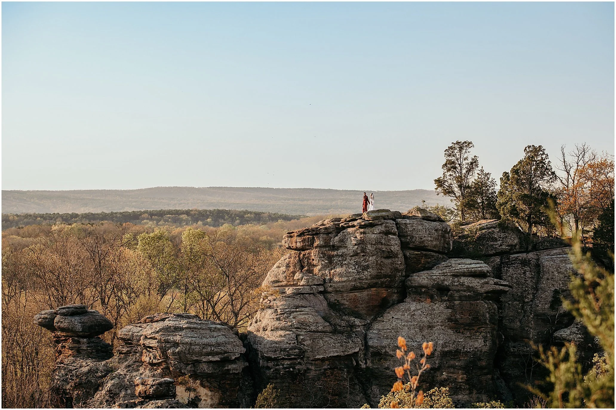 Couple on camel rock at garden of the gods in shawnee national forest