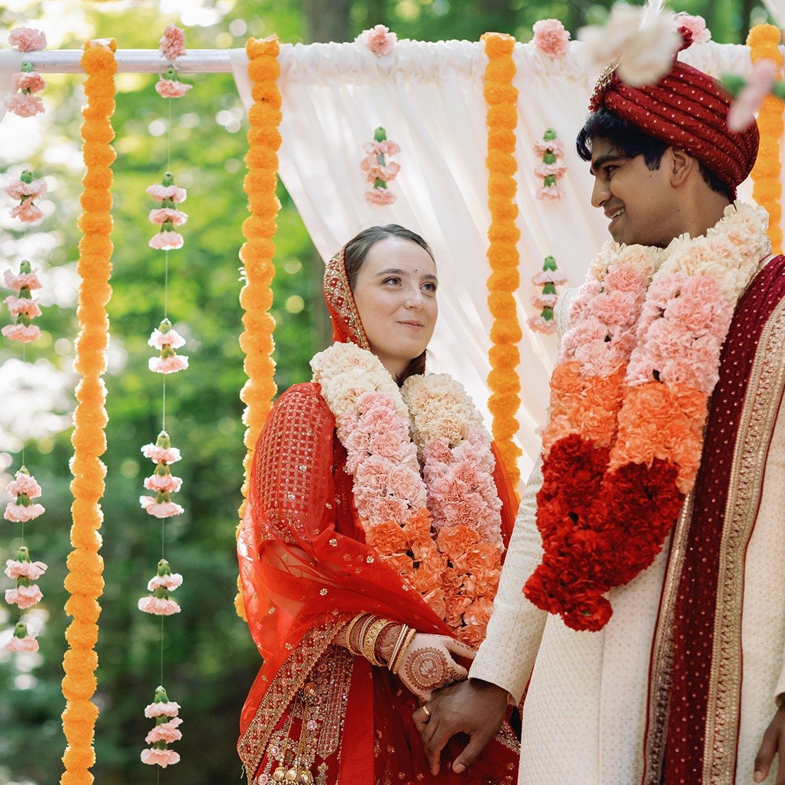 A wedding isn't just a day; it's a beautiful, timeless feeling that stays with you forever💗

Beauty: @hairandtheresalon
Bride's Indian Lehenga @meenabazaar
Engagement Ring + Wedding Bands: @aidememoirejewelry
Floral Design: @moondream_florals
Groom'