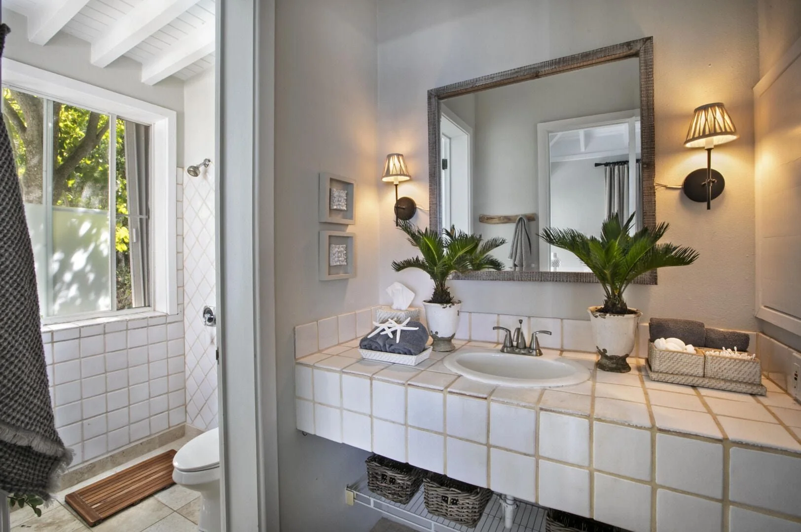 Coastal Bathroom with Walk-In Shower at On The Rocks Villa