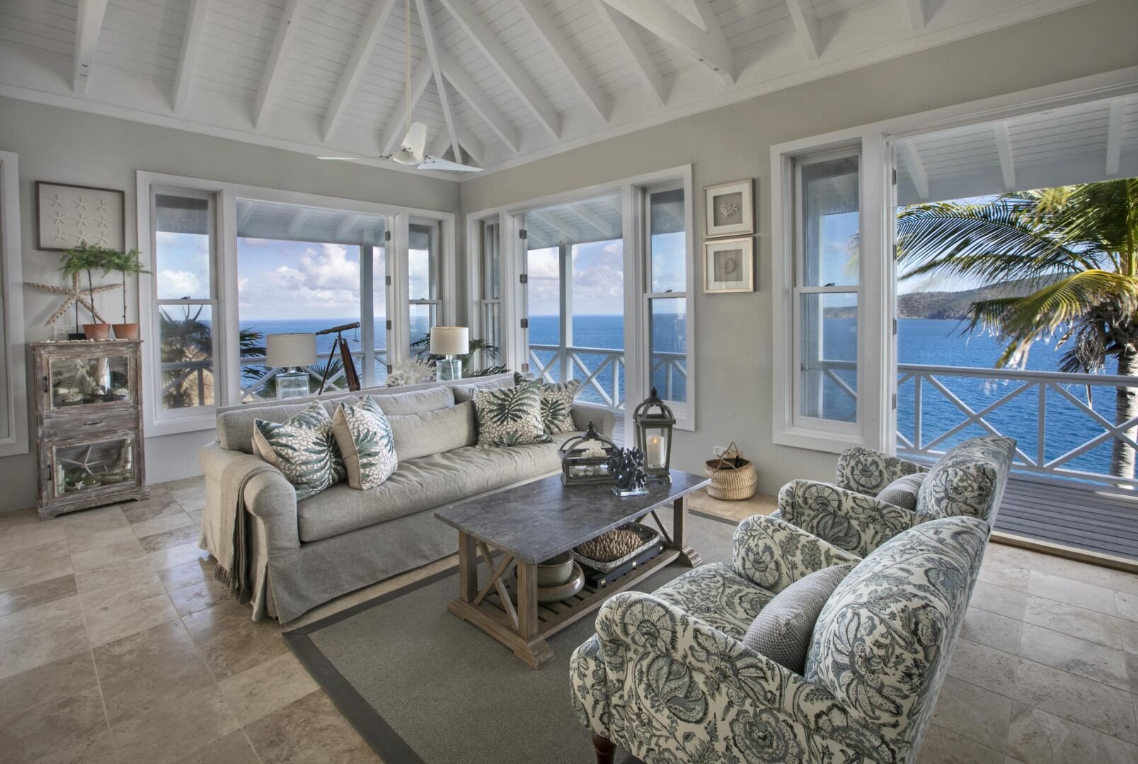 Panoramic Ocean View Living Room with Wraparound Windows