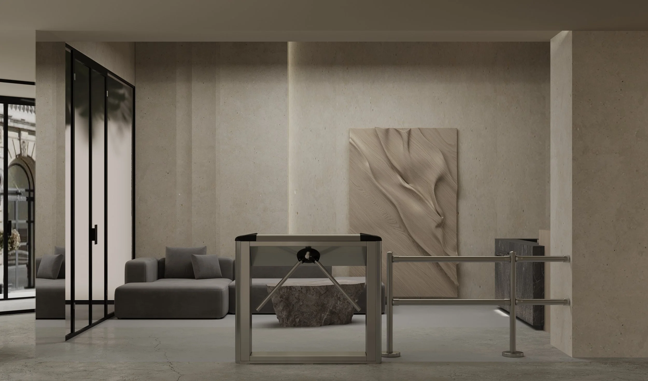Modern hotel lobby with gray sofa, abstract wooden art piece, marble table, and metal stanchions.